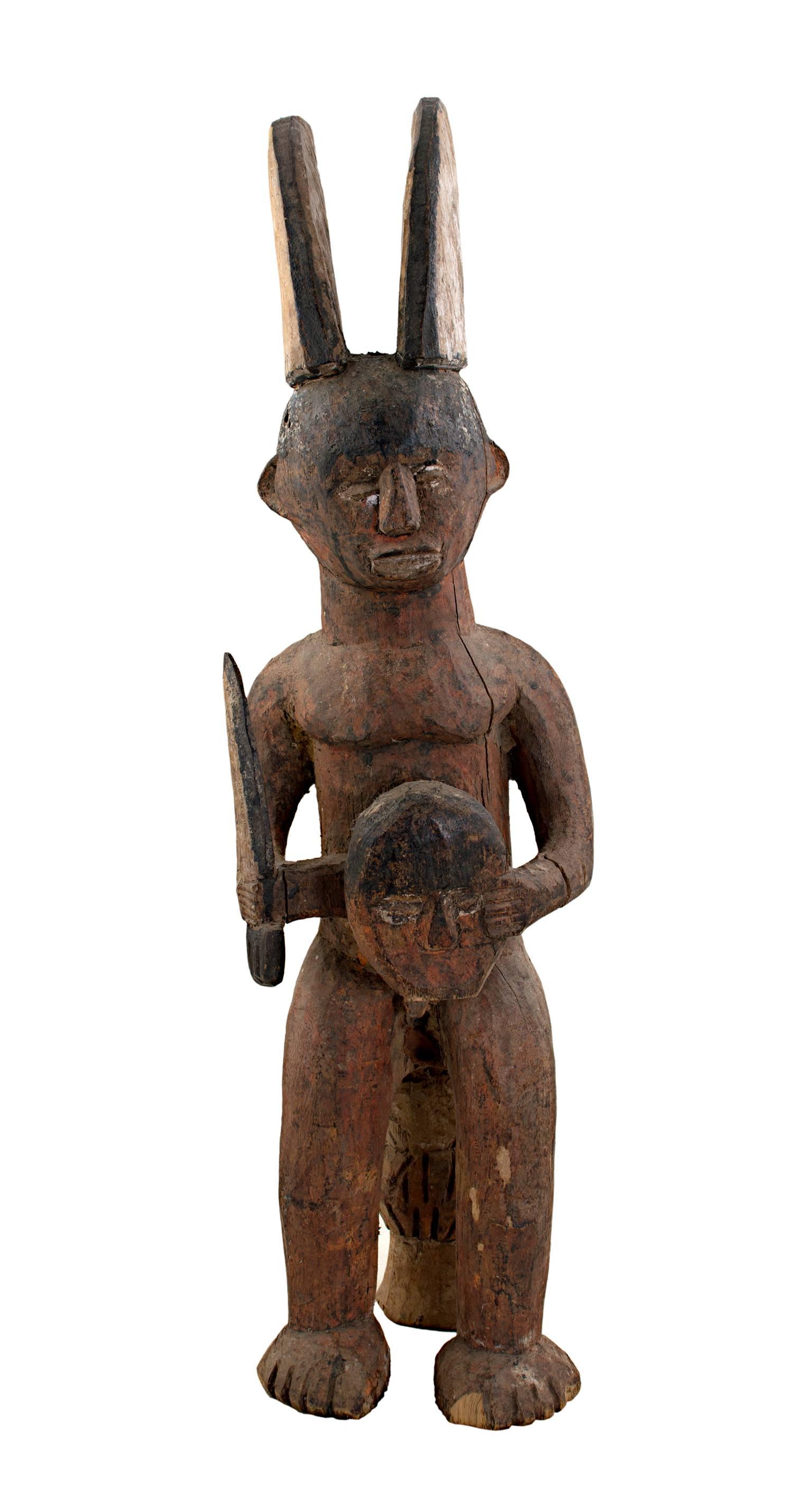Unknown Figurative Sculpture - "Ekamka Fetish - Nigeria, " Carved Wood Figure created circa 1910