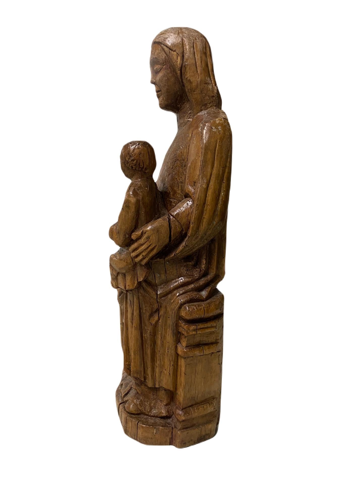 Enthroned Madonna and Child.  - Brown Figurative Sculpture by Unknown