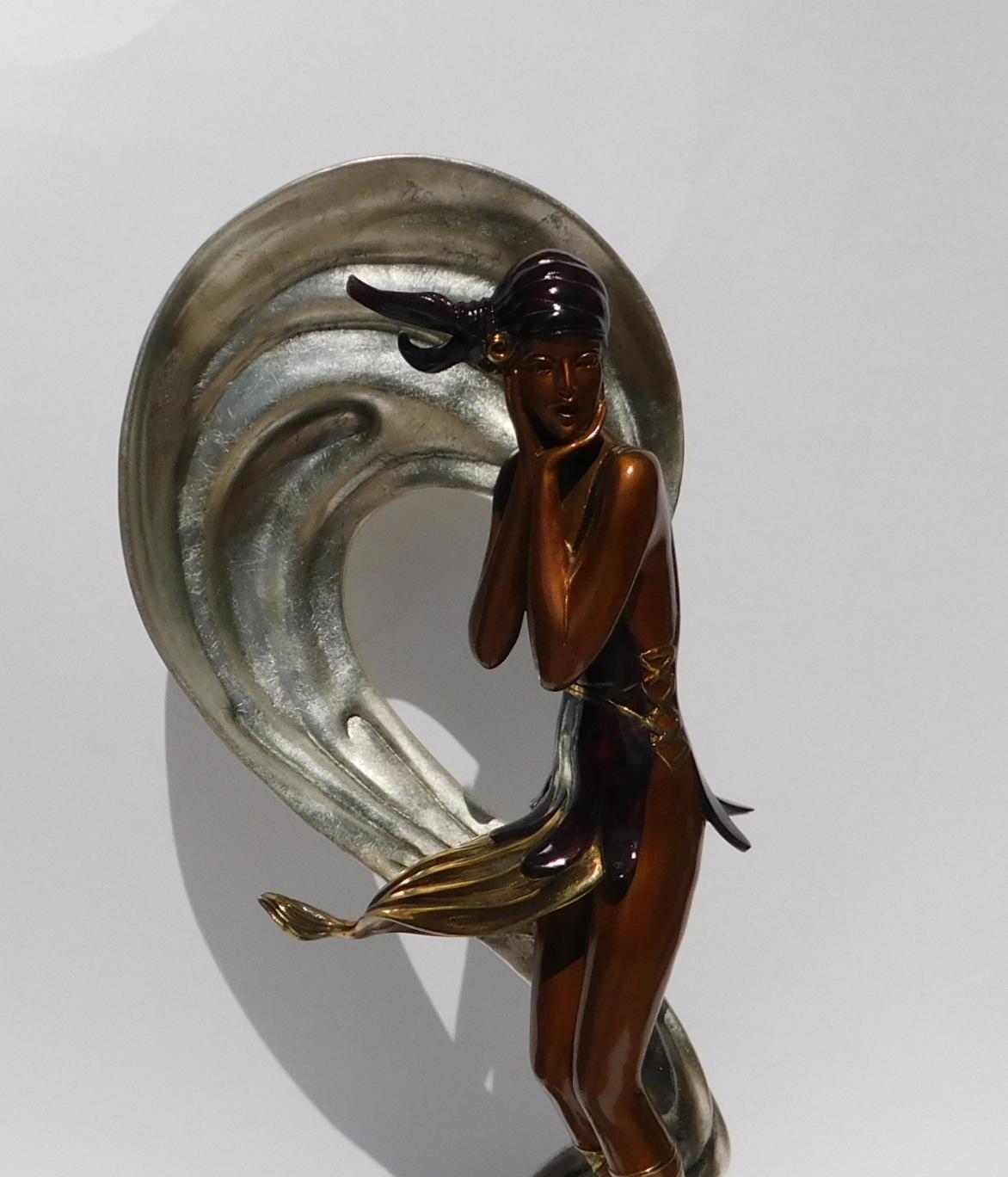 Erte Original Bronze Sculpture - Beautiful Female Figure. Ed: 375.         
Published by Chalk & Vermillion, 1988. The work is in mint condition.
Title: “Stranded.”  Measures: 20