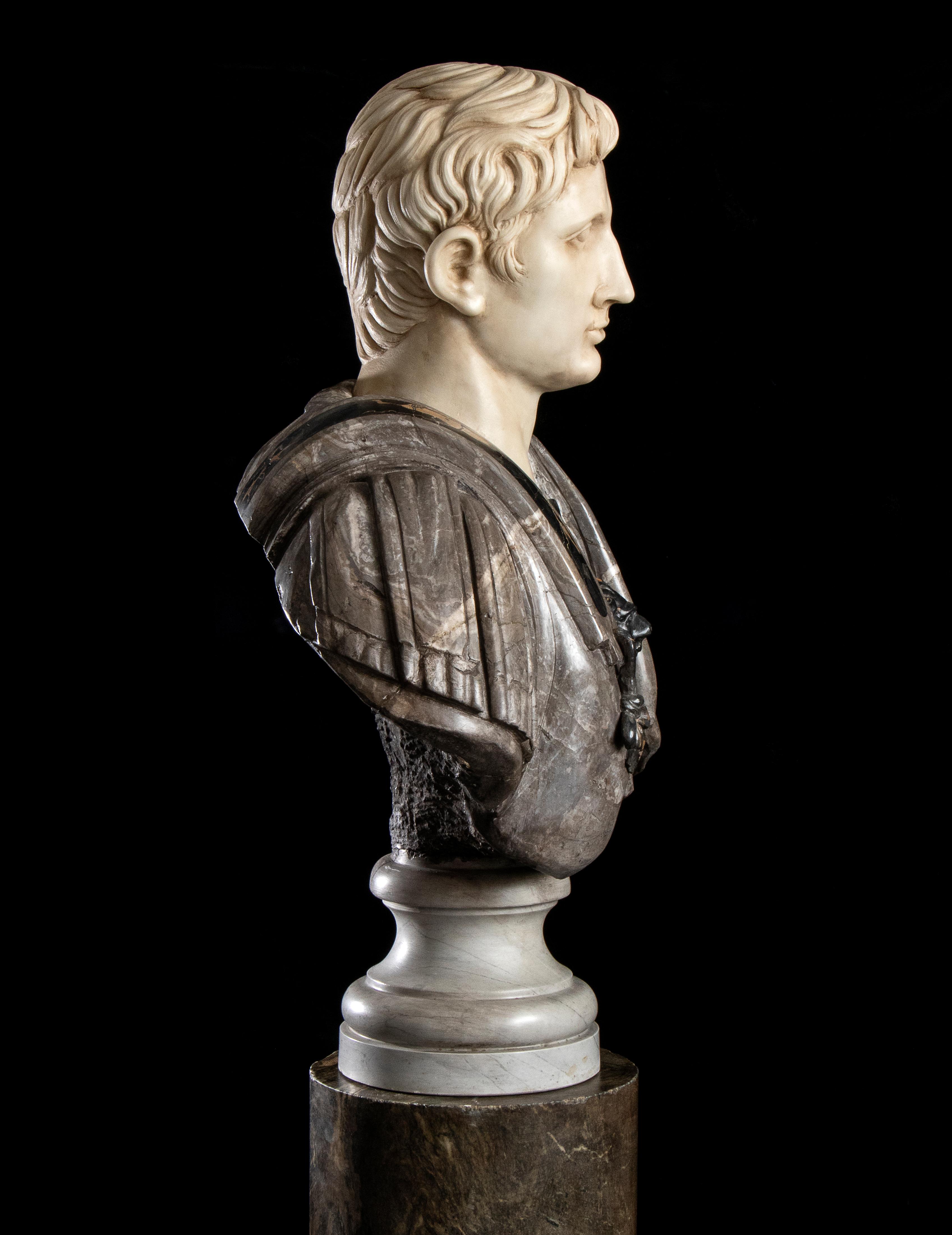 A very impressive and beautiful portrait marble polychrome sculpture bust of the famous roman emperor Augustus. Made in polychrome marble, the head is carved in white statuary marble and the bust is in Fior di Pesco marble; the Lion's head and the