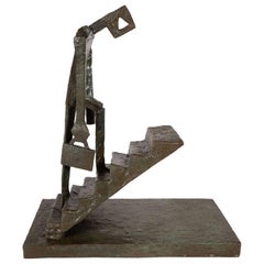 Vintage Figurative Sculpture of Man with Briefcase Ascending Stairs