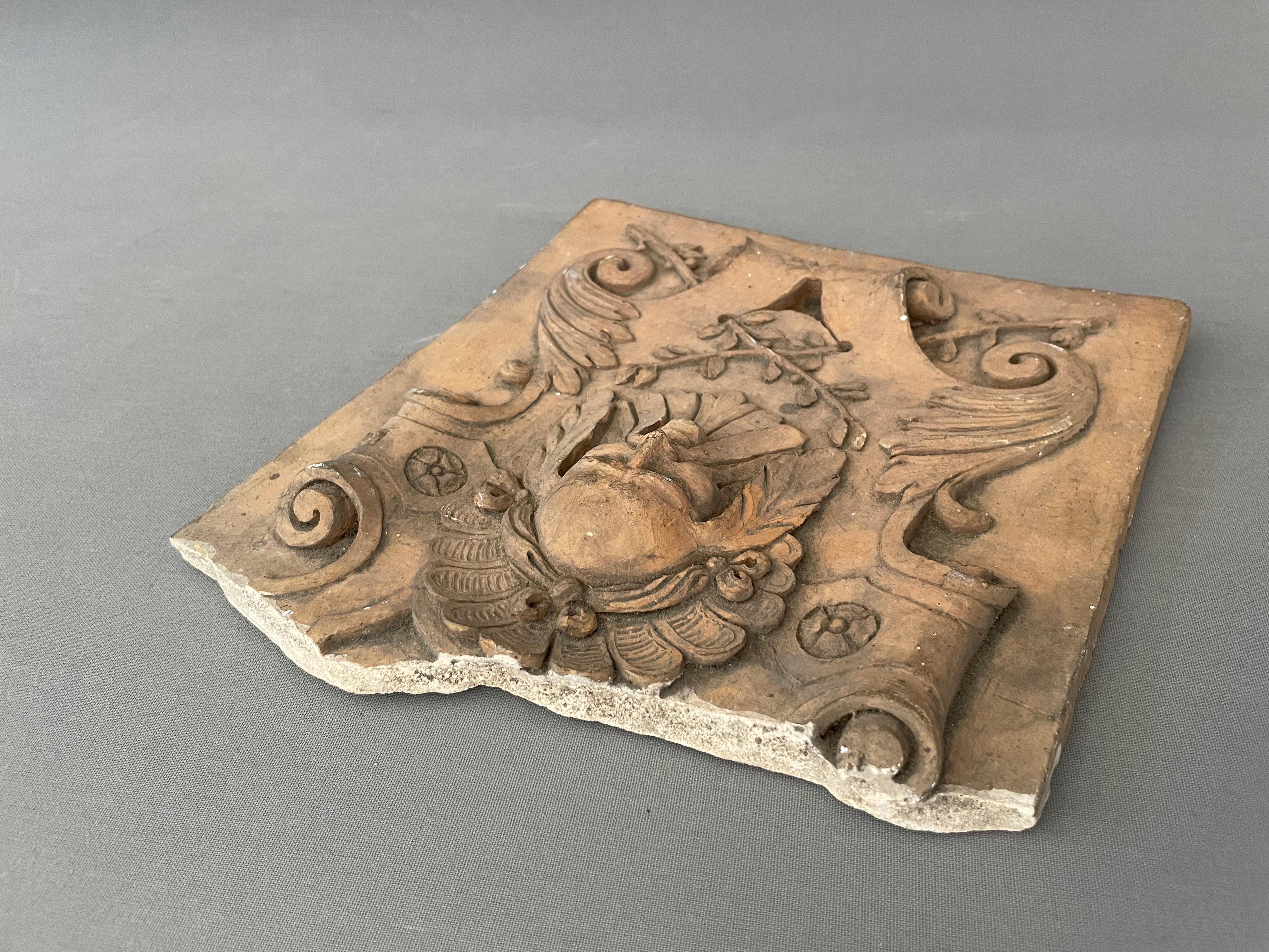 Fragment Of Terracotta Tile - Brown Figurative Sculpture by Unknown