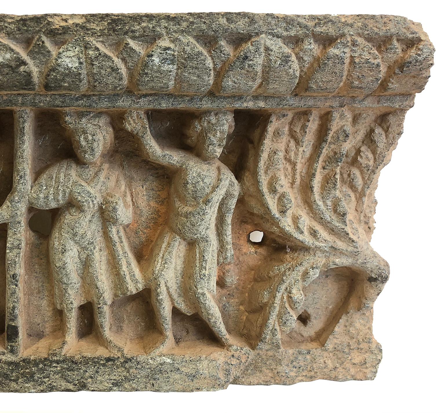 Frieze in two panels., showing a group of donors with a palm tree in the right corner. This is a fine example of Gandhara sculpture with exceptional provenance and exhibition history.

The Kingdom of Gandhara, was located in the region of present