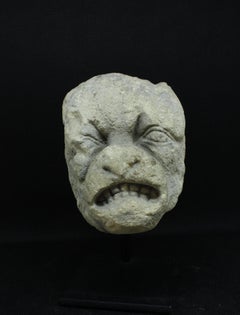 14th-century Gothic gargoyle in limestone
