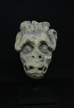 14th-century Gothic gargoyle in limestone