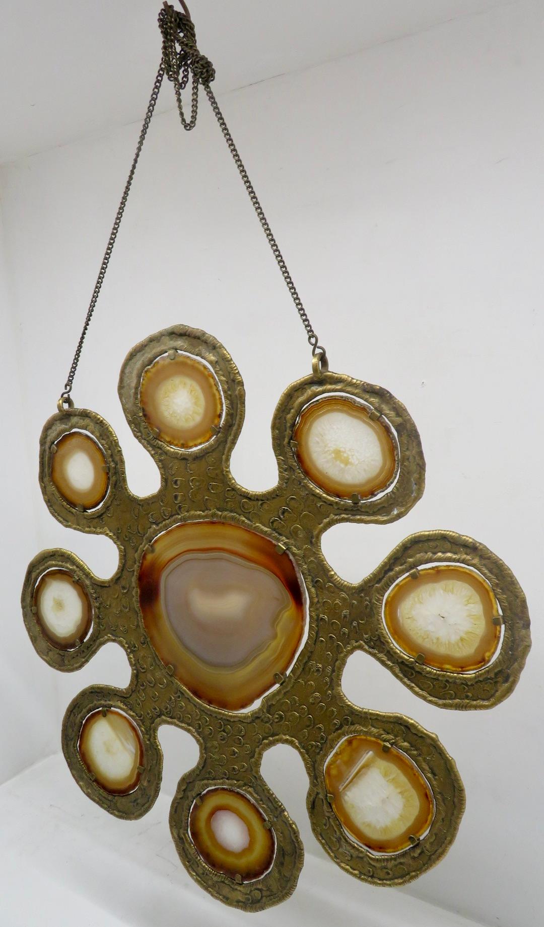 A very interesting 1960's brutalist wall hanging sculpture, constructed from hammered copper with 9 agate gemstone insets. All in wonderful condition, a most unusual and attractive item.