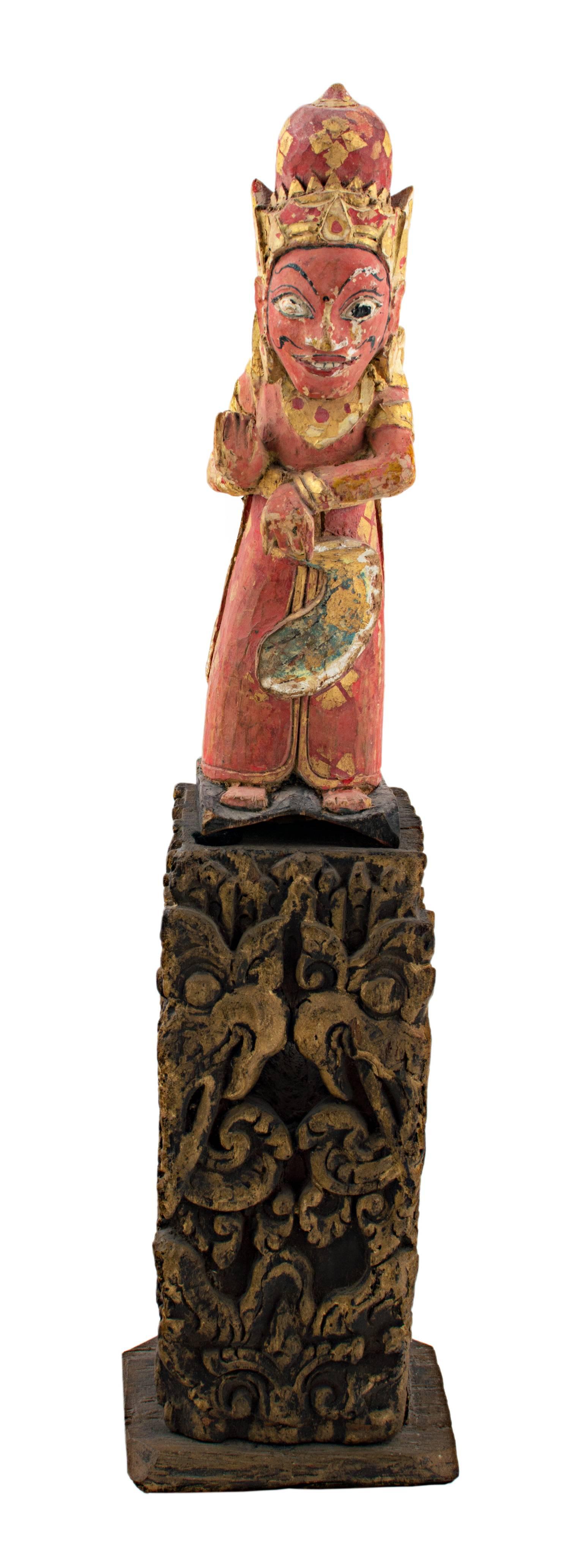 Unknown Figurative Sculpture - "Hand-Carved Indonesian Wooden Finial with Decorative Base, " Carved Painted Wood