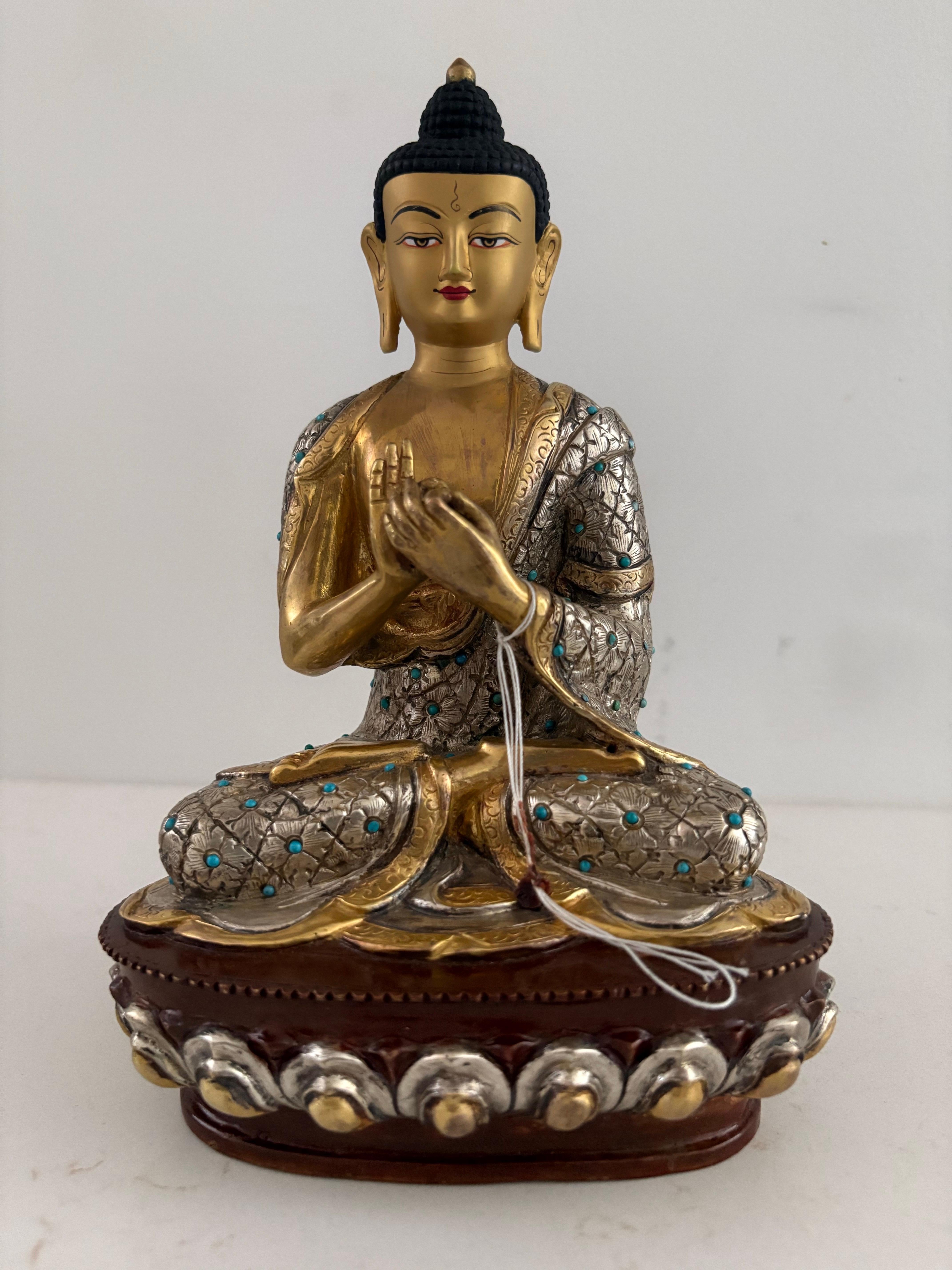 Cet ensemble exquis de cinq statues de Bouddha 