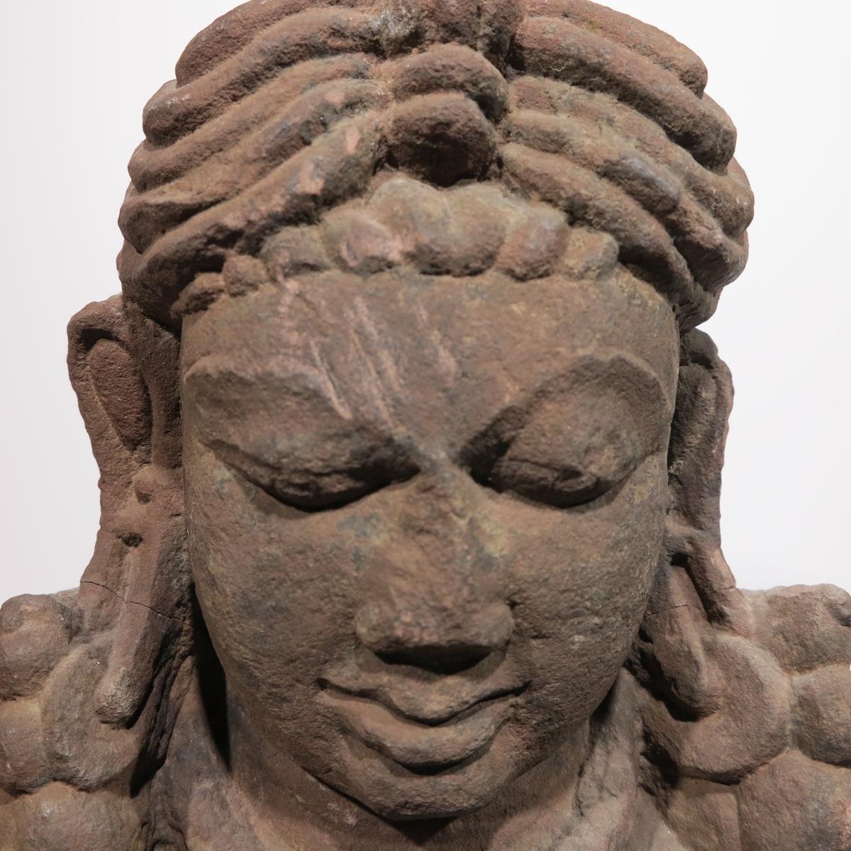 Beautiful Head of Indian Goddess, possibly Gupta. Cental india, 6th-8th century. Measures h. 12.5 inches, w. 9 inches, d. 4.25 inches. Measures 16 x 10.25 x 6.5 with wood stand. 