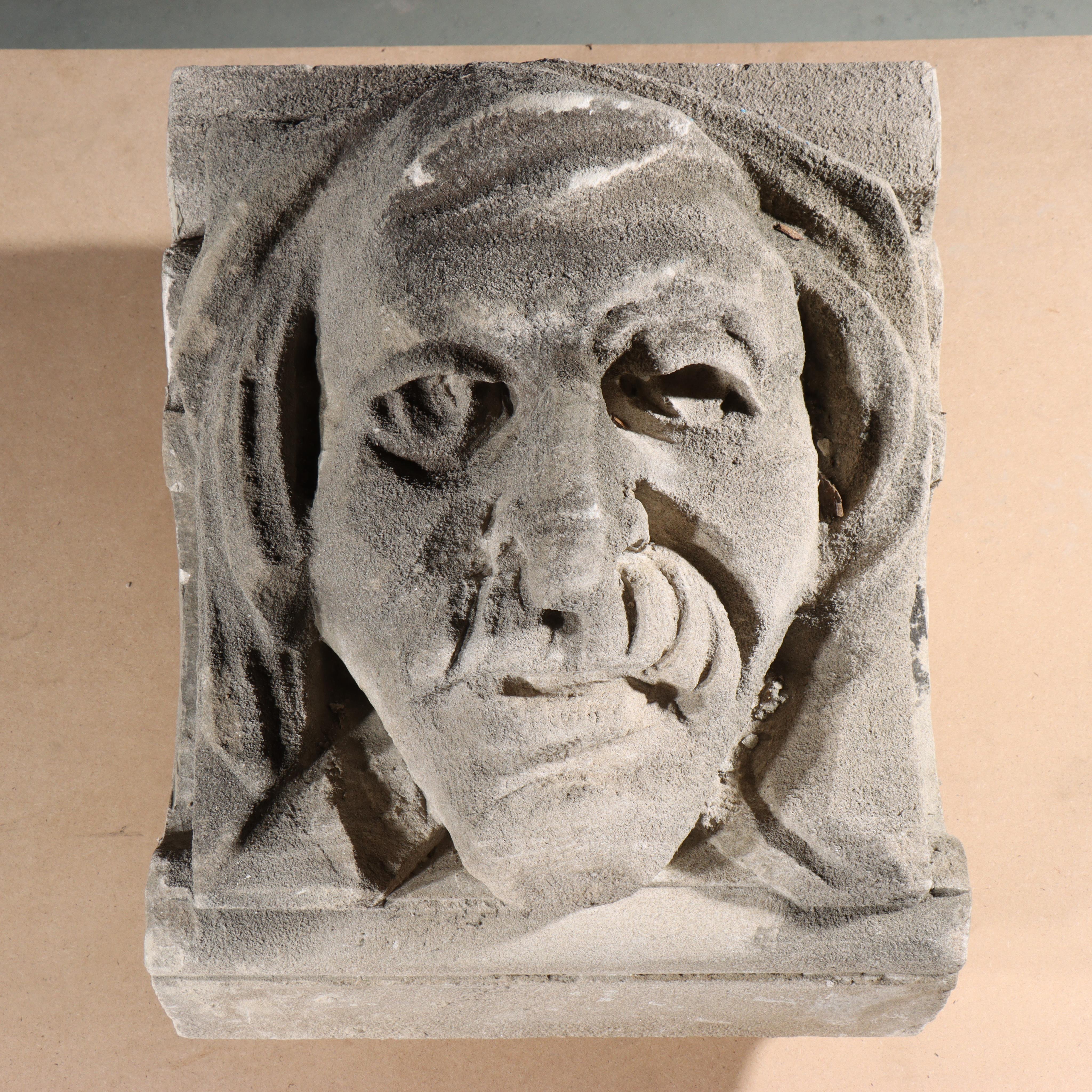 This gothic style architectural segment of a building facade located ion Harlem, NYC, was carved 1924-1926 by William Bradley & Son Cut Stone Contractors. In 2020, each limestone sculpture was removed by hand from the The A. Philip Randolph Campus