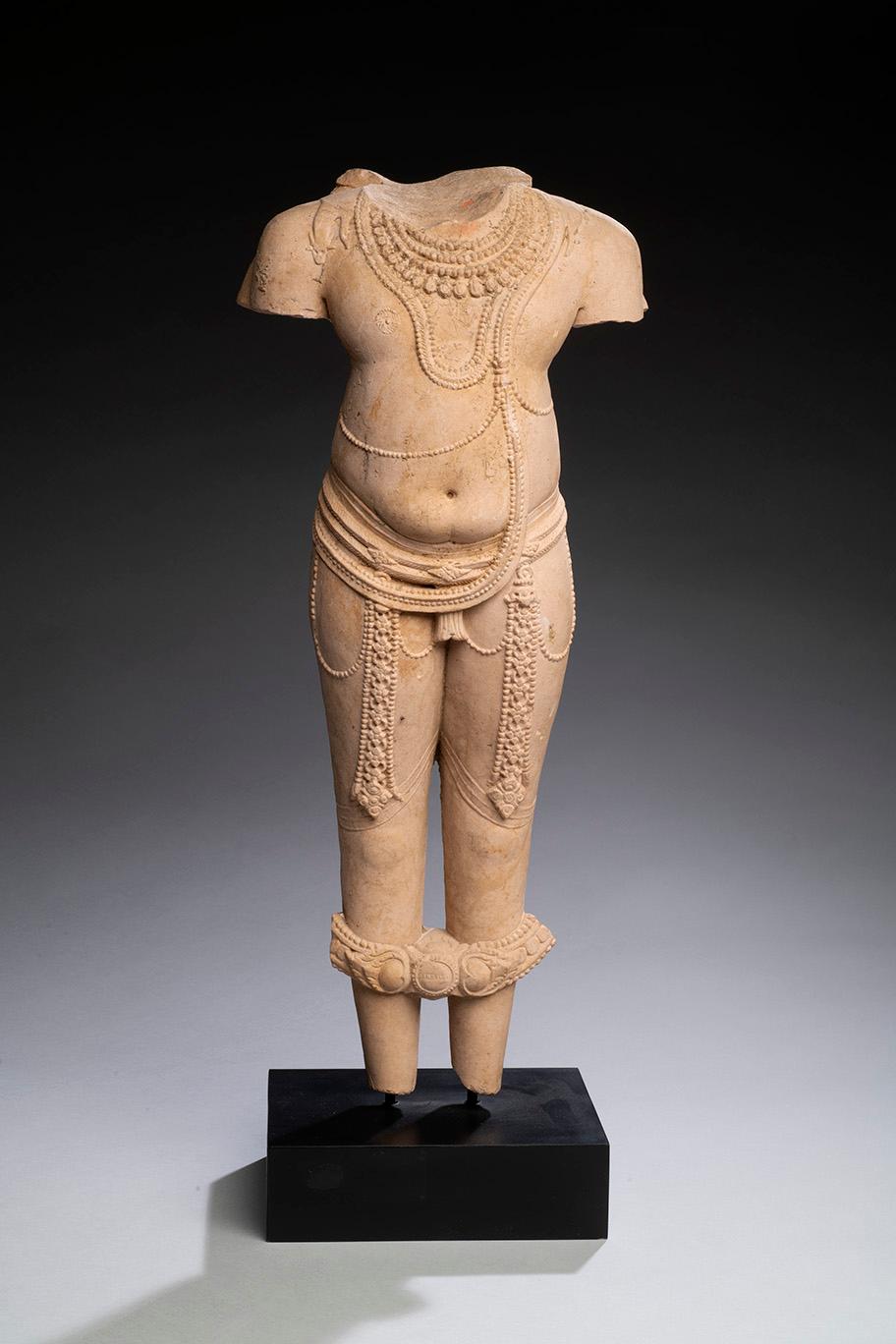 Unknown Figurative Sculpture - Indian Pink Sandstone Figure of a Deity, Central India, 11th/12th century