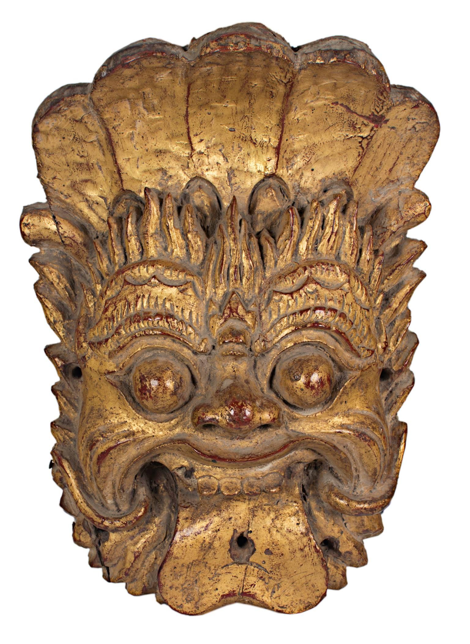 "Indonesian Mask, " Wood with Gold Leaf of Smiling Man - Sculpture by Unknown
