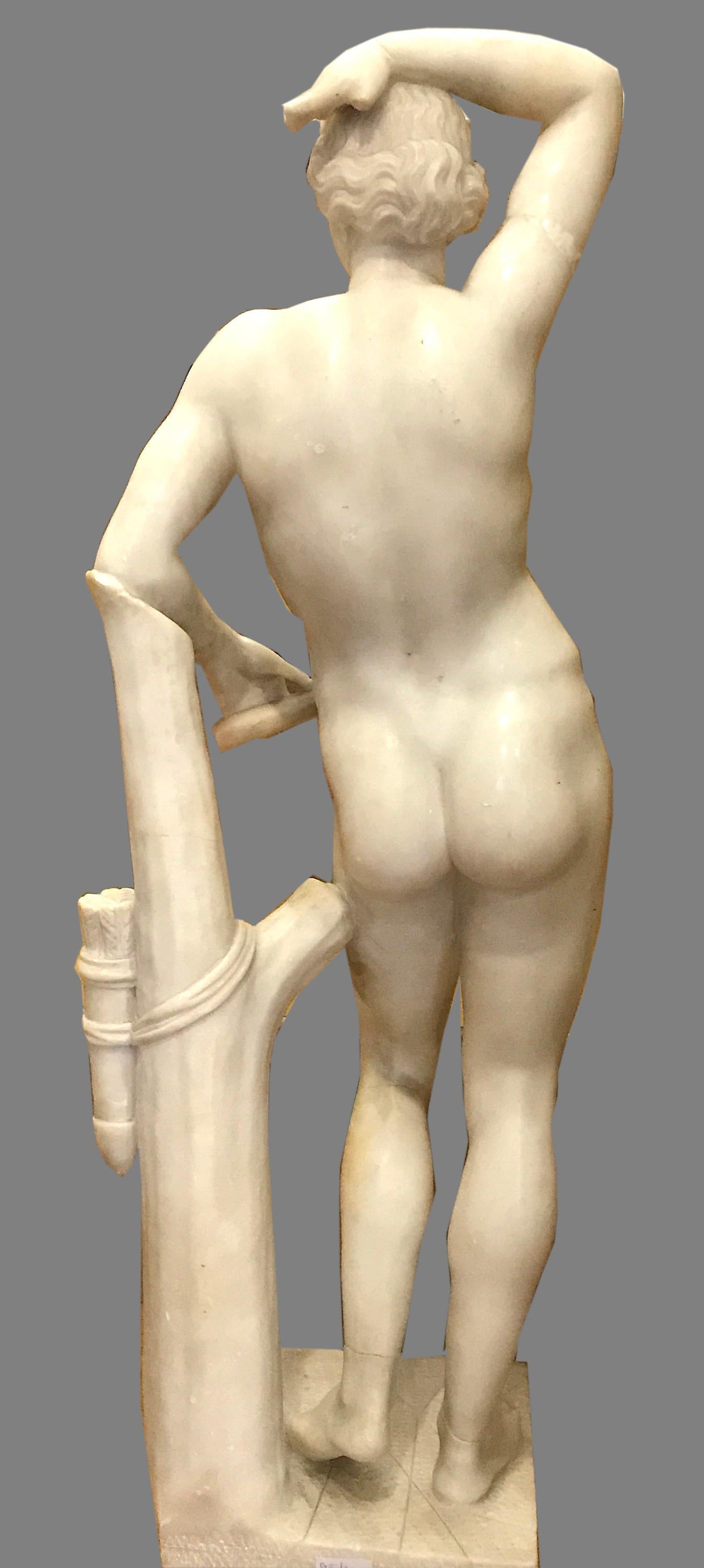 
A 19th century Italian finely carved alabaster marble figure of Apollino, after the Antique .
Figure standing and leaning against a tree trunk on square base . Ancient restorations.