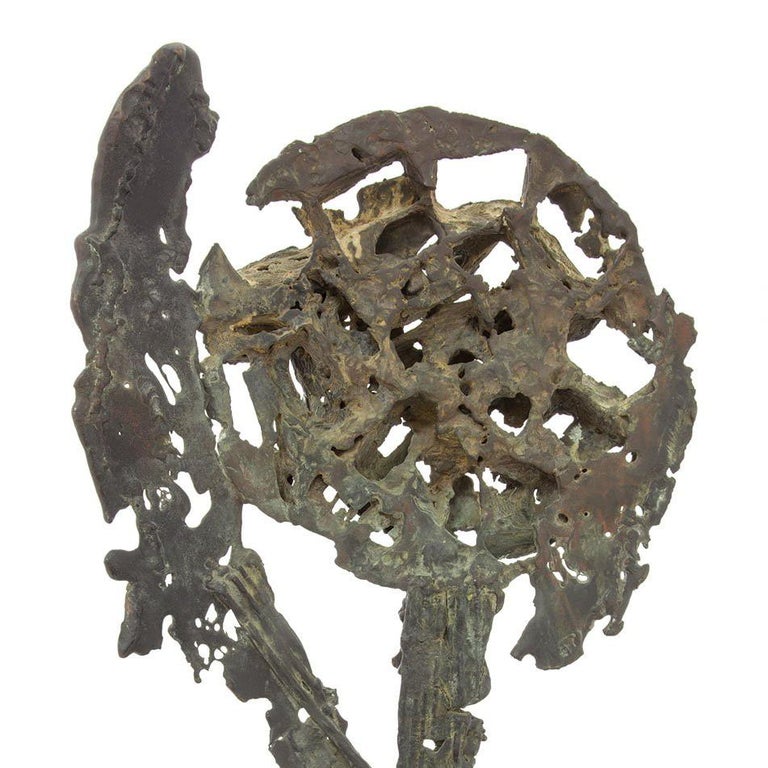 Large Modern Brutalist bronze sculpture in Manner of Arnaldo or Gio Pomodoro. We cannot locate a signature or any markings. it has an abstract quality to it. heavily textured with original patina. it might be one of a kind. It seems to be a cast