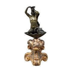 Italian sculptor - 17th-18th century bronze Triton playing a conch shell