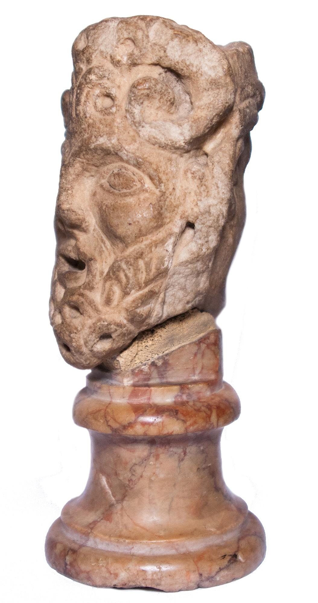 Janiform marble head, Italy, 12th-13th century - Sculpture by Unknown