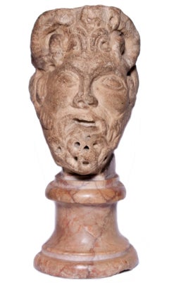Janiform marble head, Italy, 12th-13th century