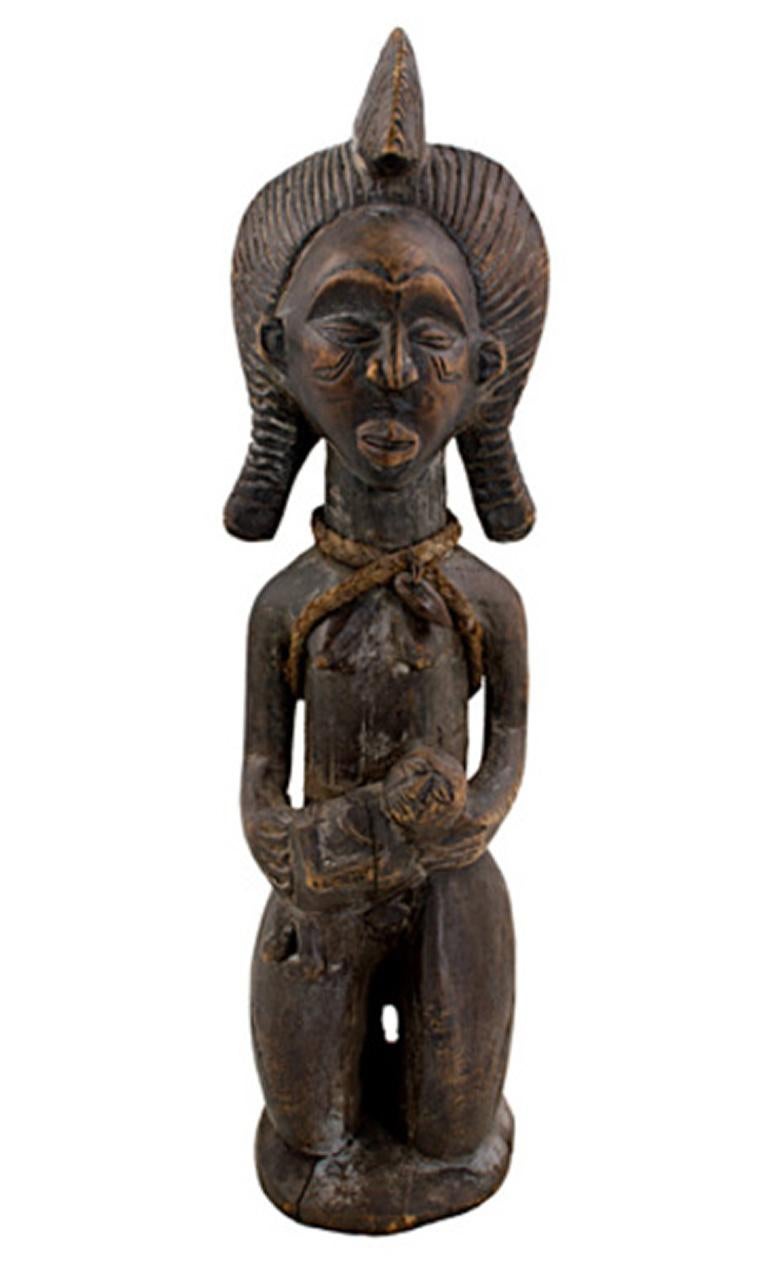 Unknown Figurative Sculpture - "Jokwe Maternity, Angola, " Carved Wood created in Africa circa 1910