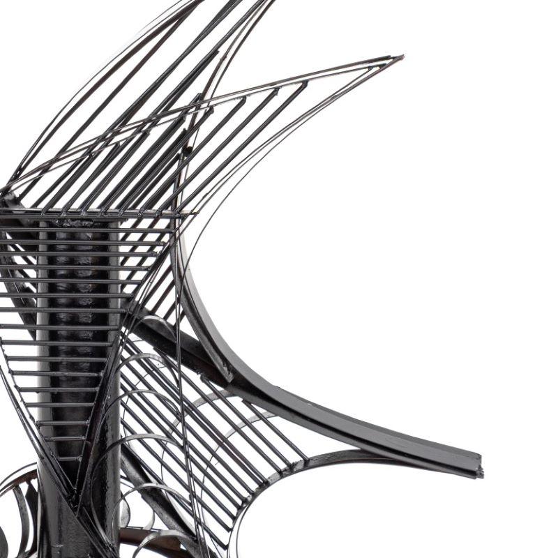 Large Abstract Black Painted Metal Sculpture on Stand, in an openwork form of abstract sails, resting on a tubular steel base atop a square foot. 69.5