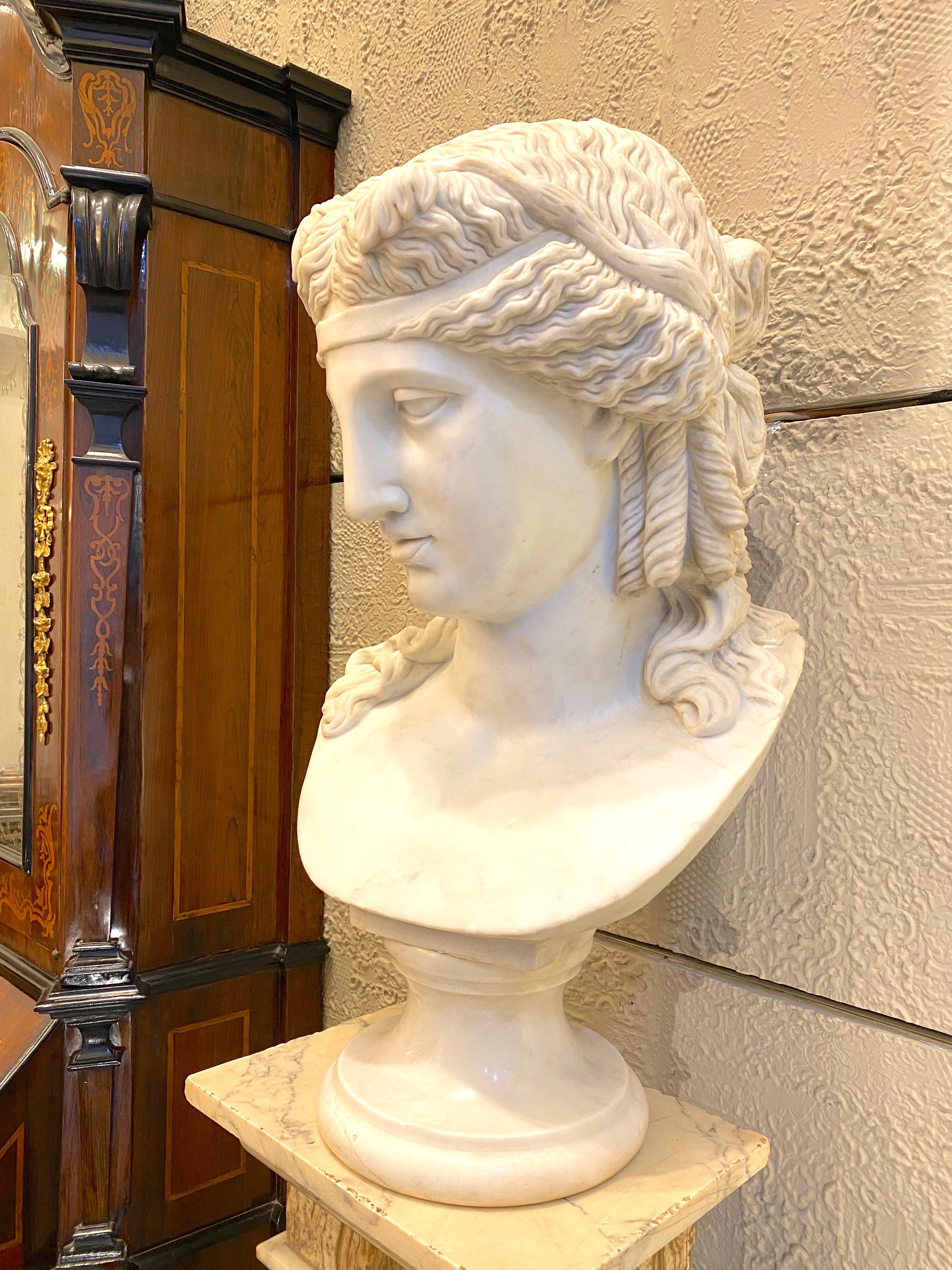 Very fine large Neoclassical  white marble bust of Arianna wearing a diadem with grape vine in her hair  after the antique in Vatican Museum .
Ariadne, in Greek mythology (Latin Arianna, French Arianne), was daughter of King Minos of Crete and his