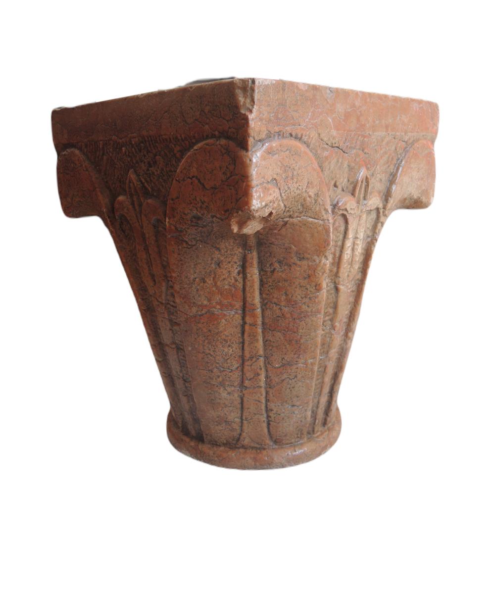 Large romanesque capital with water leaf in red Verona marble. This type of capital is typical of 12th century Cistercian abbeys and represents a transition between Romanesque and Gothic art. The sobriety and aesthetics of this capital stand out