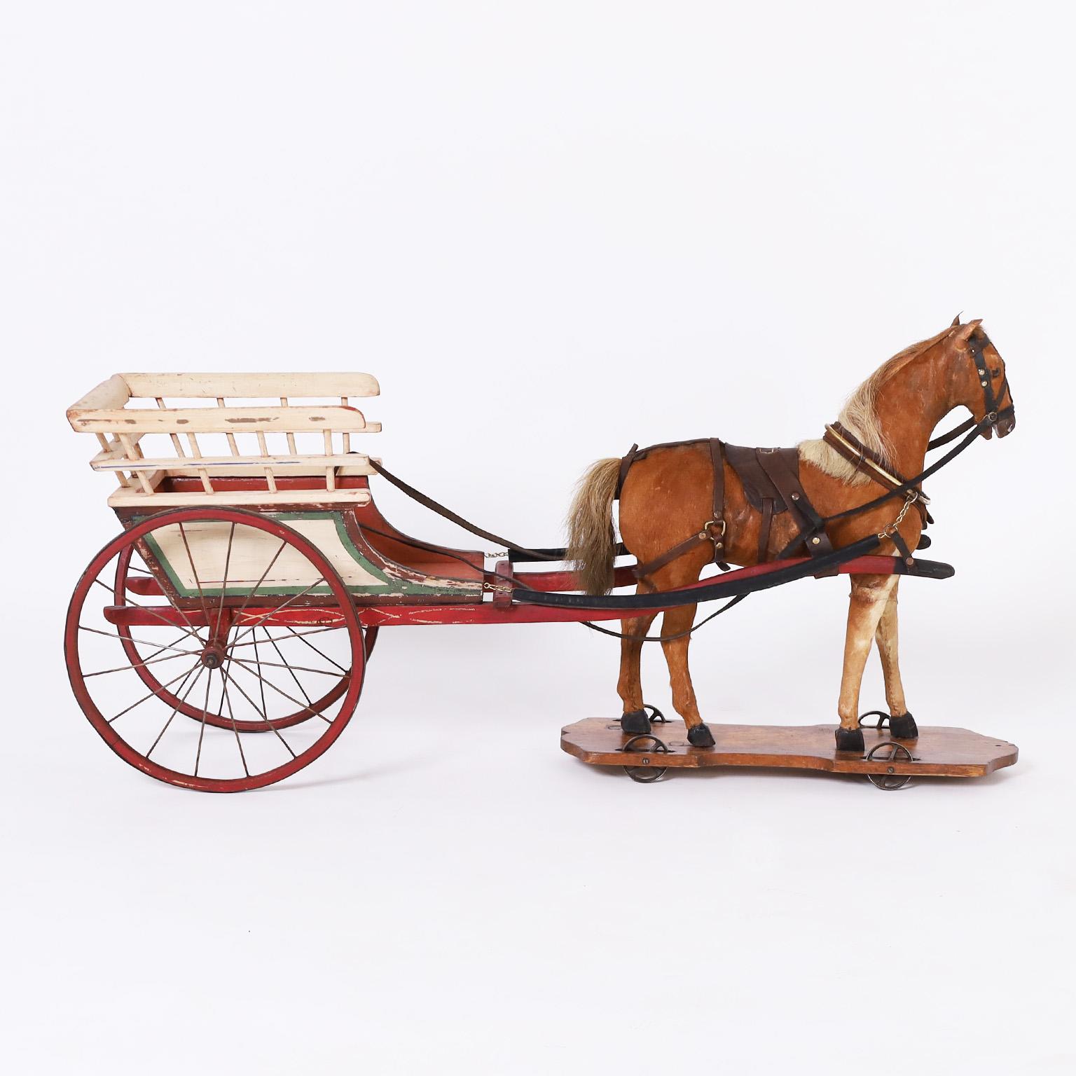 Grand cheval et charrette en jouet Vintage - Marron Figurative Sculpture par Unknown