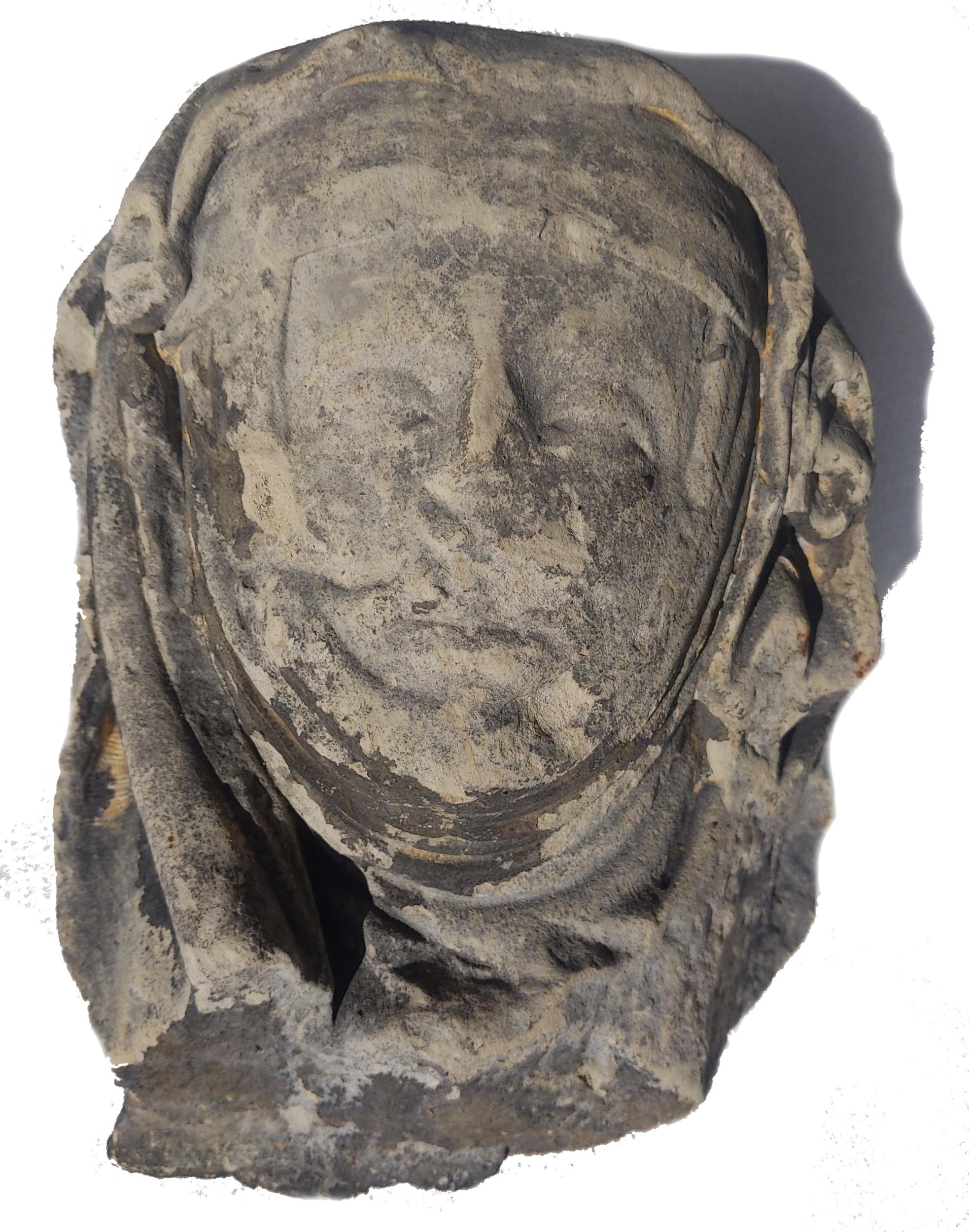Unknown Figurative Sculpture - Limestone head of an abbess circa 1400