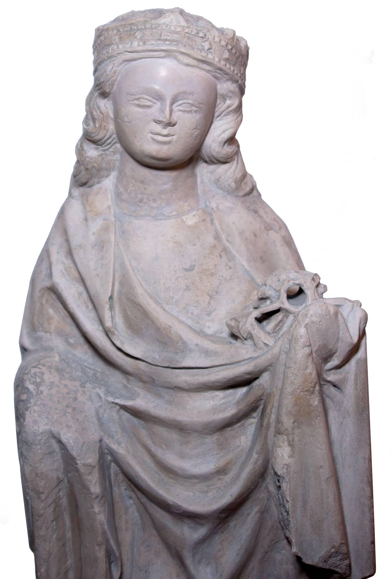 Limestone statue of St. Catherine, early XIV th century - Sculpture by Unknown