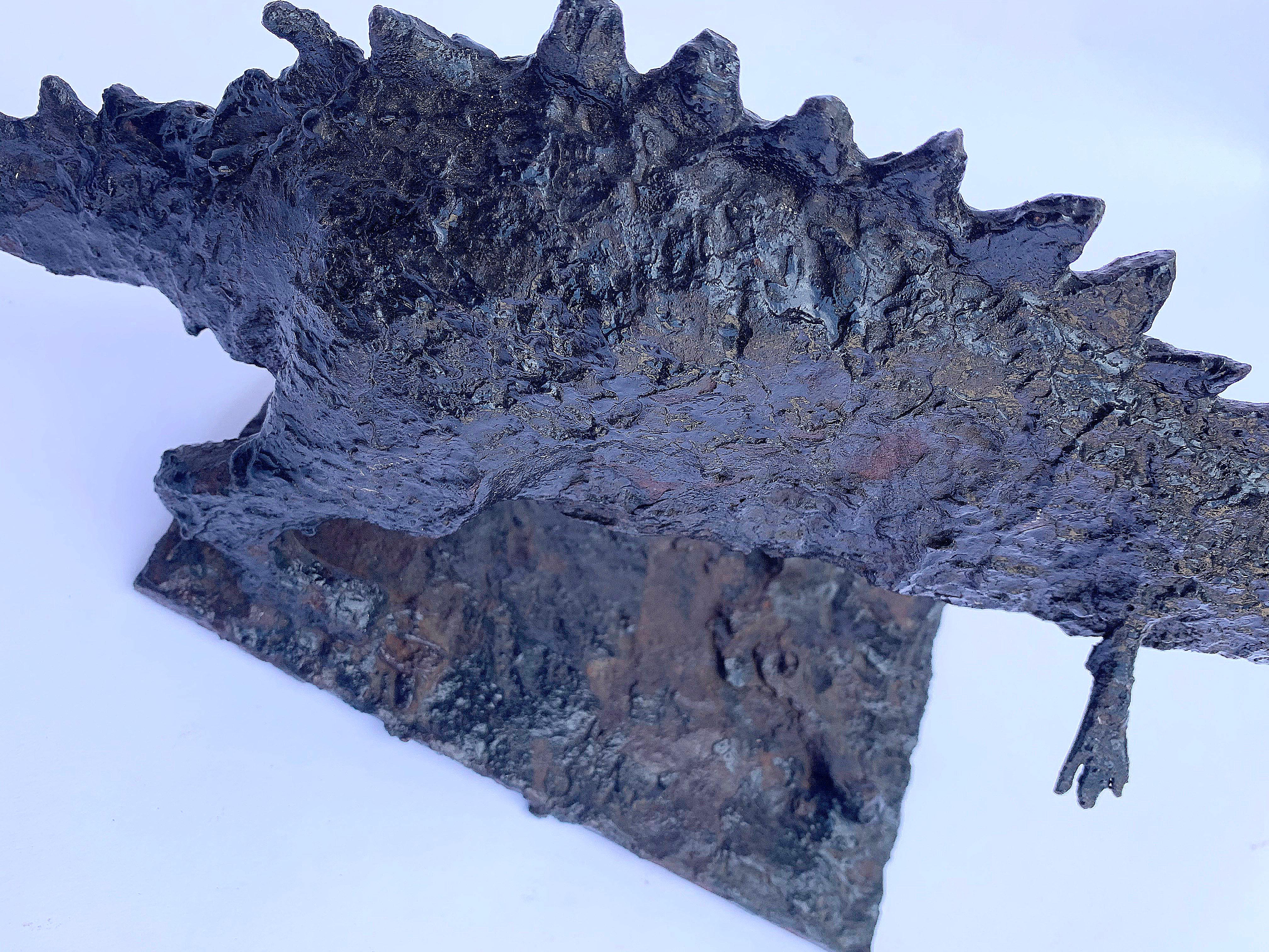 Long Brutalist Steel Dinosaur, slender with rust and tar-like finish - Black Figurative Sculpture by Unknown