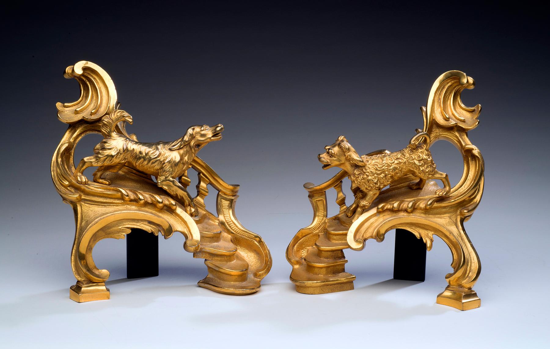 Unknown Figurative Sculpture - Louis XV-Style Gilt Bronze Chenets With a Poodle and a Hound - a Pair
