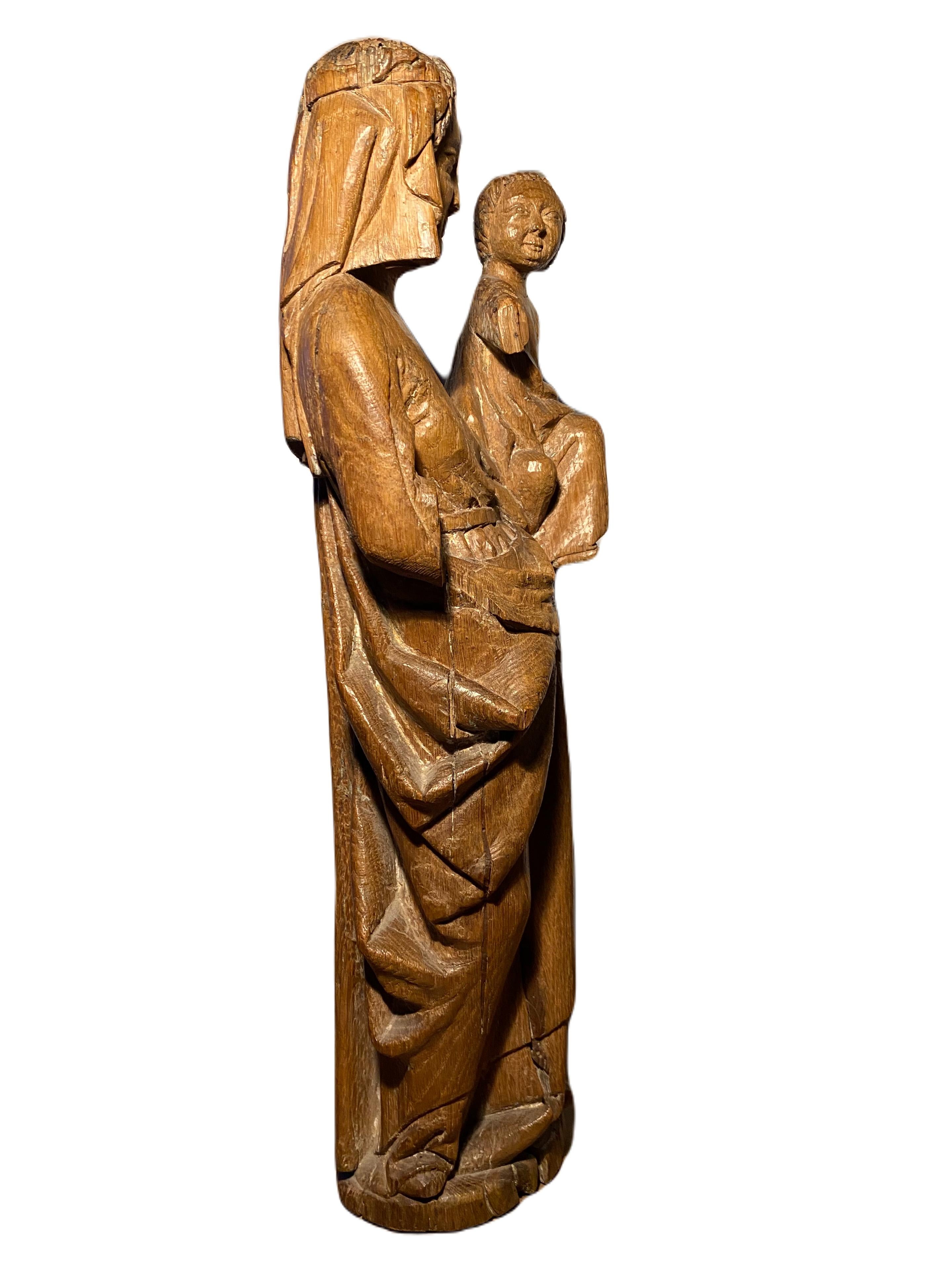 Madonna and Child. 14th century Parisian workshops. - Gothic Sculpture by Unknown