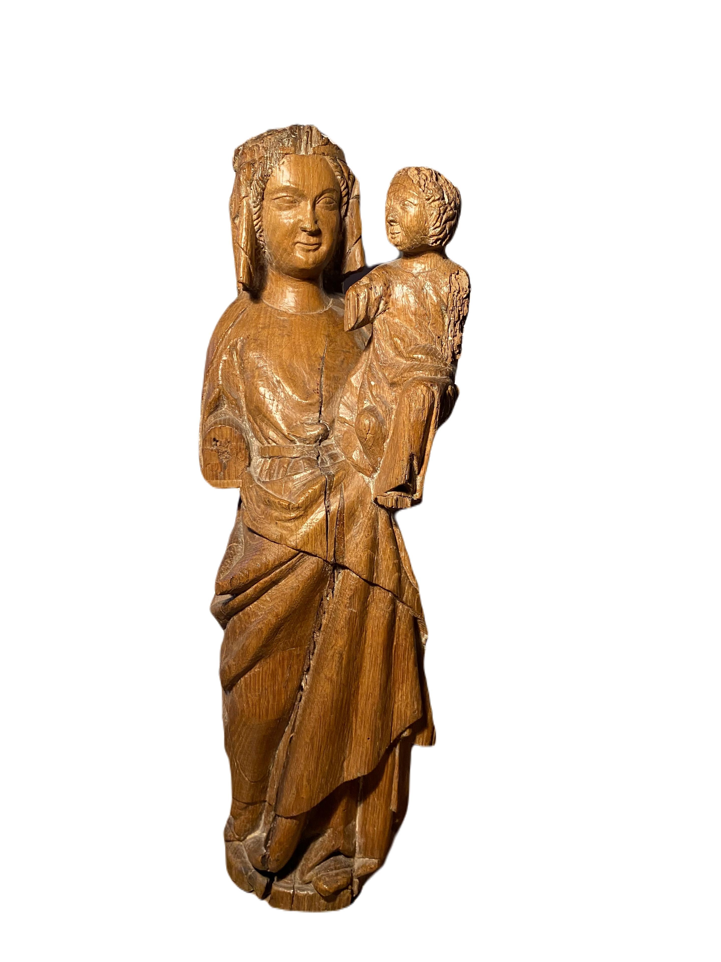 Unknown Figurative Sculpture - Madonna and Child. 14th century Parisian workshops.