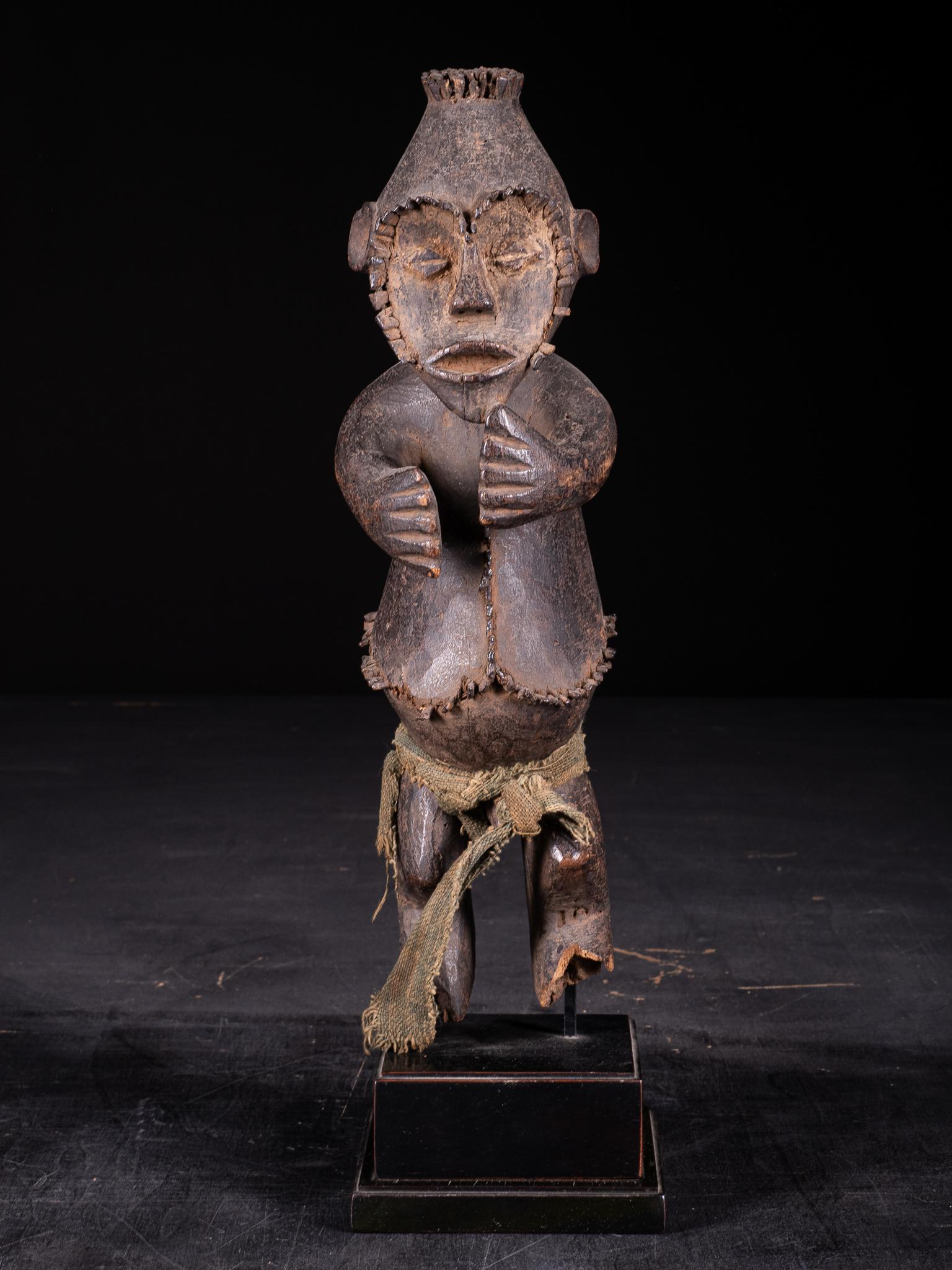 Unknown Figurative Sculpture - Mambila Tadep Male Guardian Figure with metal Pegs contouring face and body