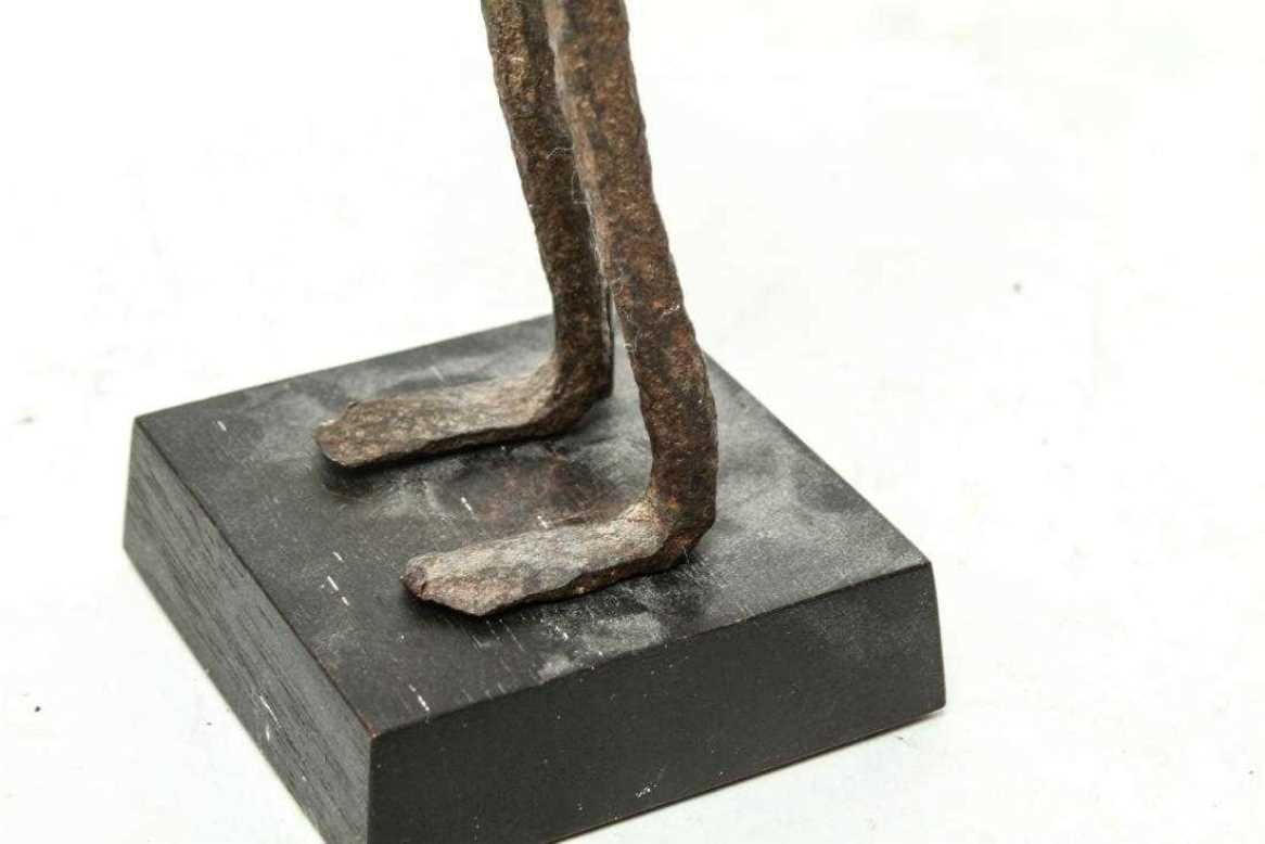 Man standing - Brown Figurative Sculpture by Unknown