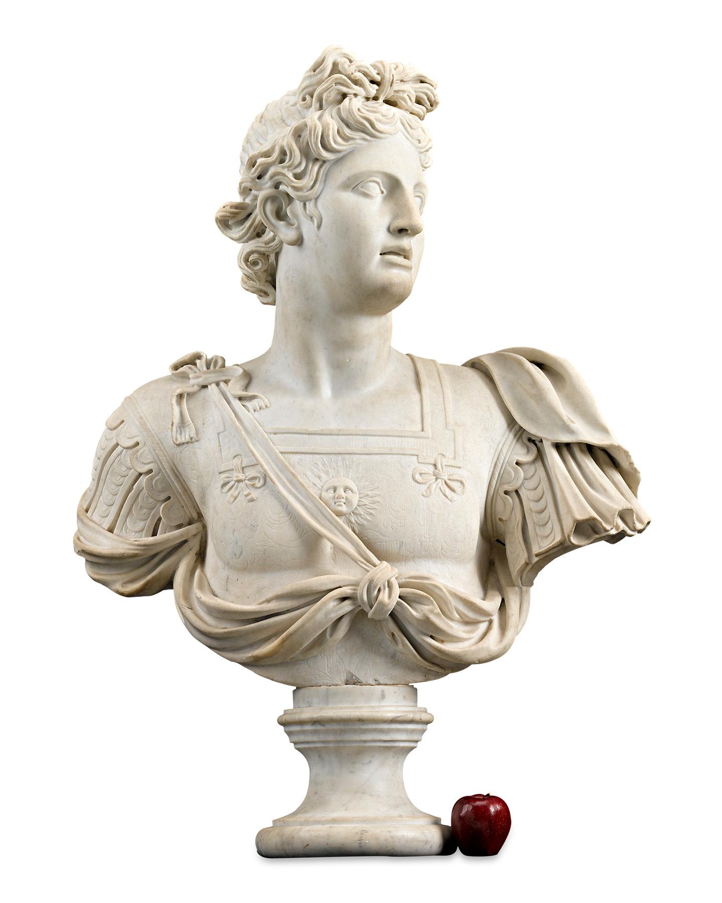An imposing work of extraordinary artistry, this marble bust captures the visage of Apollo, the handsome god who is one of the most legendary Olympian deities from antiquity. The son of Zeus and Leto, and twin brother of the huntress Artemis, he was