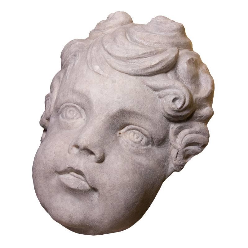 Marble head of a putto, circa 1700  - Baroque Sculpture by Unknown