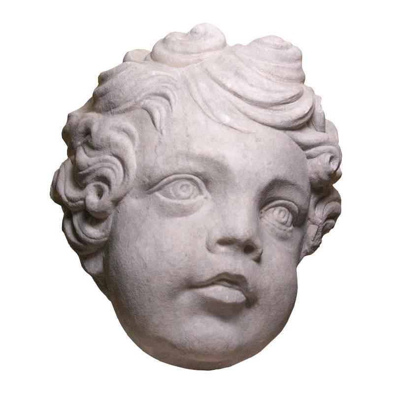 Unknown Figurative Sculpture - Marble head of a putto, circa 1700 