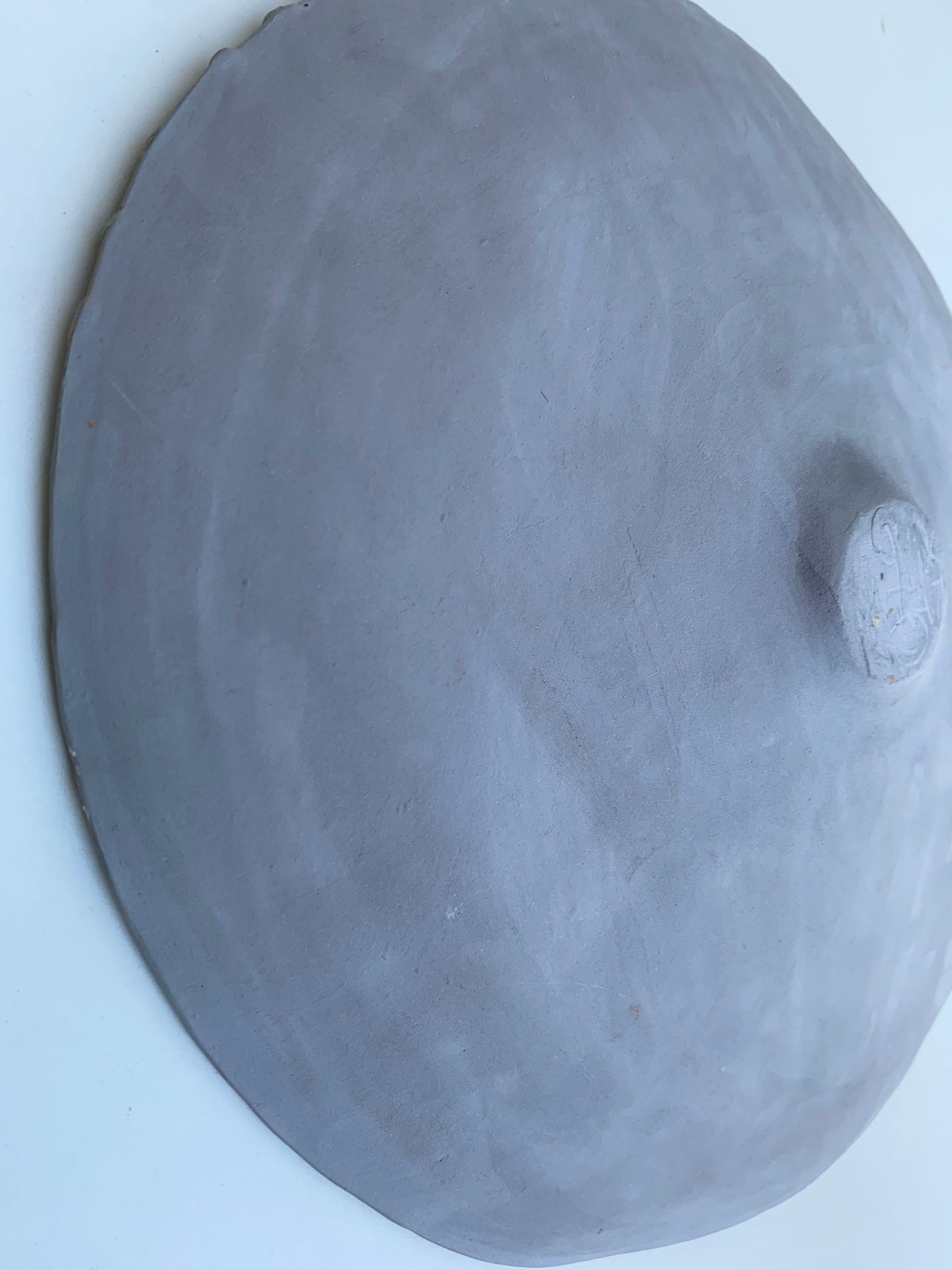 unglazed ceramic plate