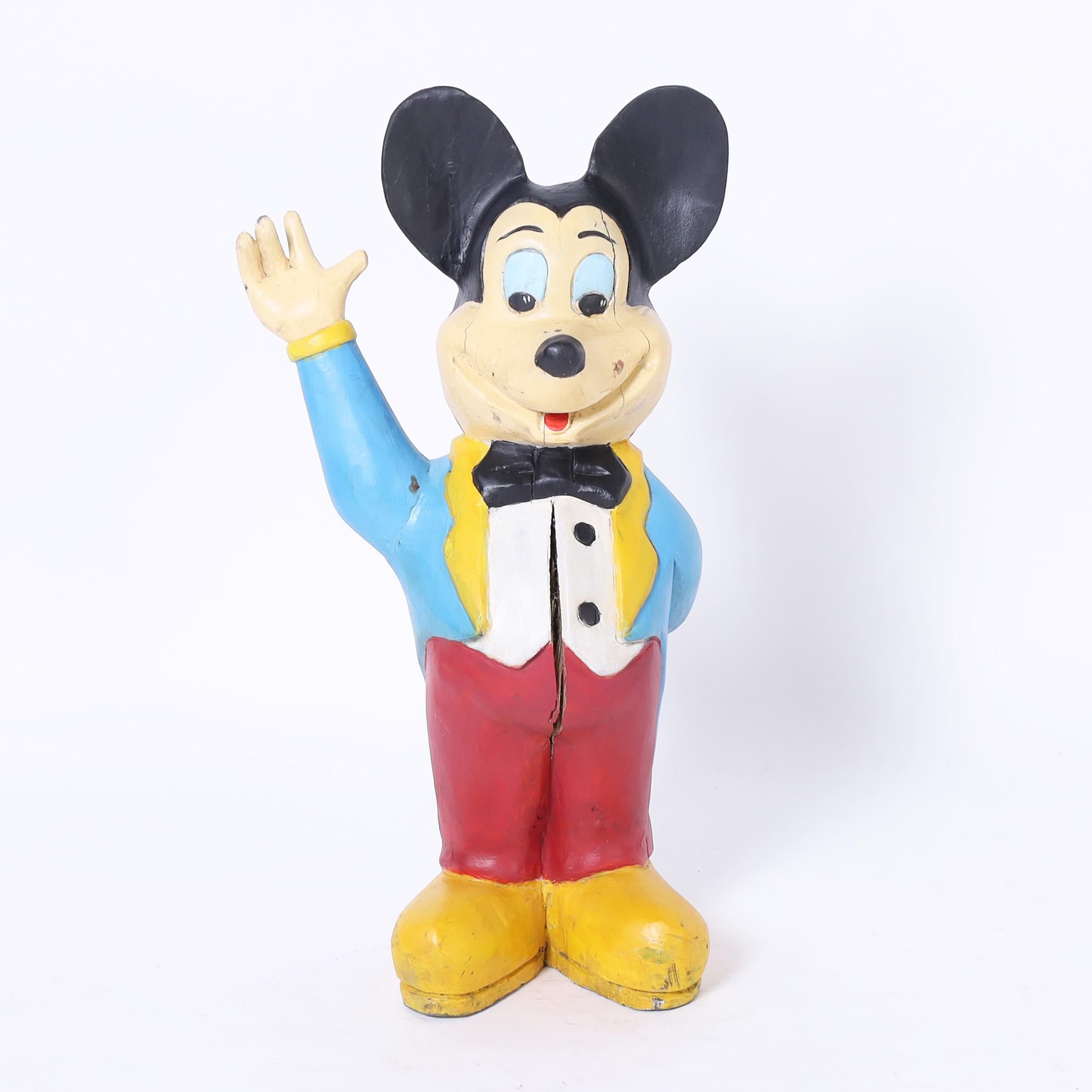 Whimsical Mickey Mouse wood sculpture hand carved and painted in his blue tuxedo. 