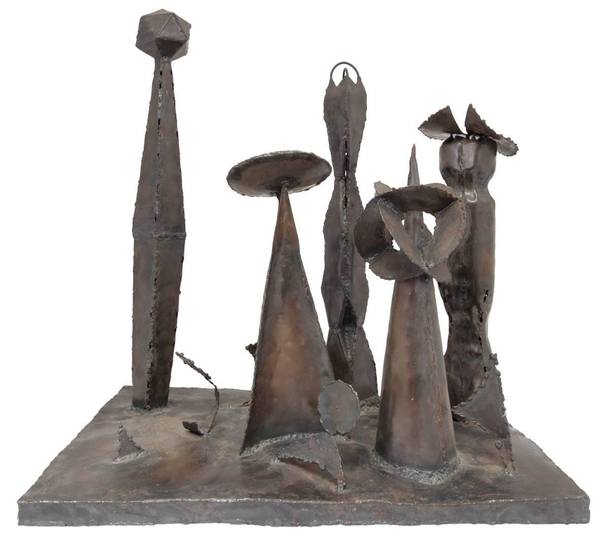 In this bronze sculpture the artist (unknown) has welded together a group of totems or monuments into a unified piece. T
Neo-Dada Abstract Sculpture: Assemblages

In contrast, abstract sculpture followed a slightly different course. Rather than