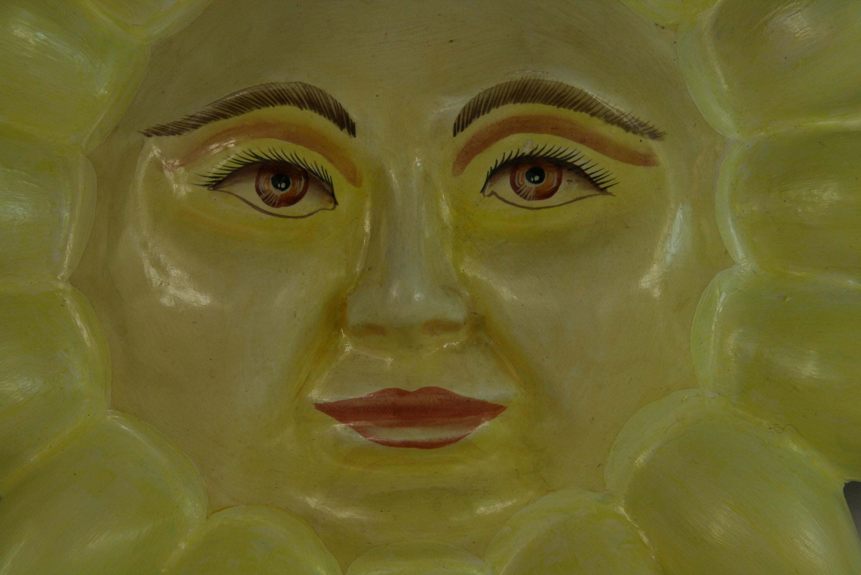 8-273a Hand made and painted papier mache sun wall sculpture from the workshop of Mexican artist 
Sergio Bustamante 1970