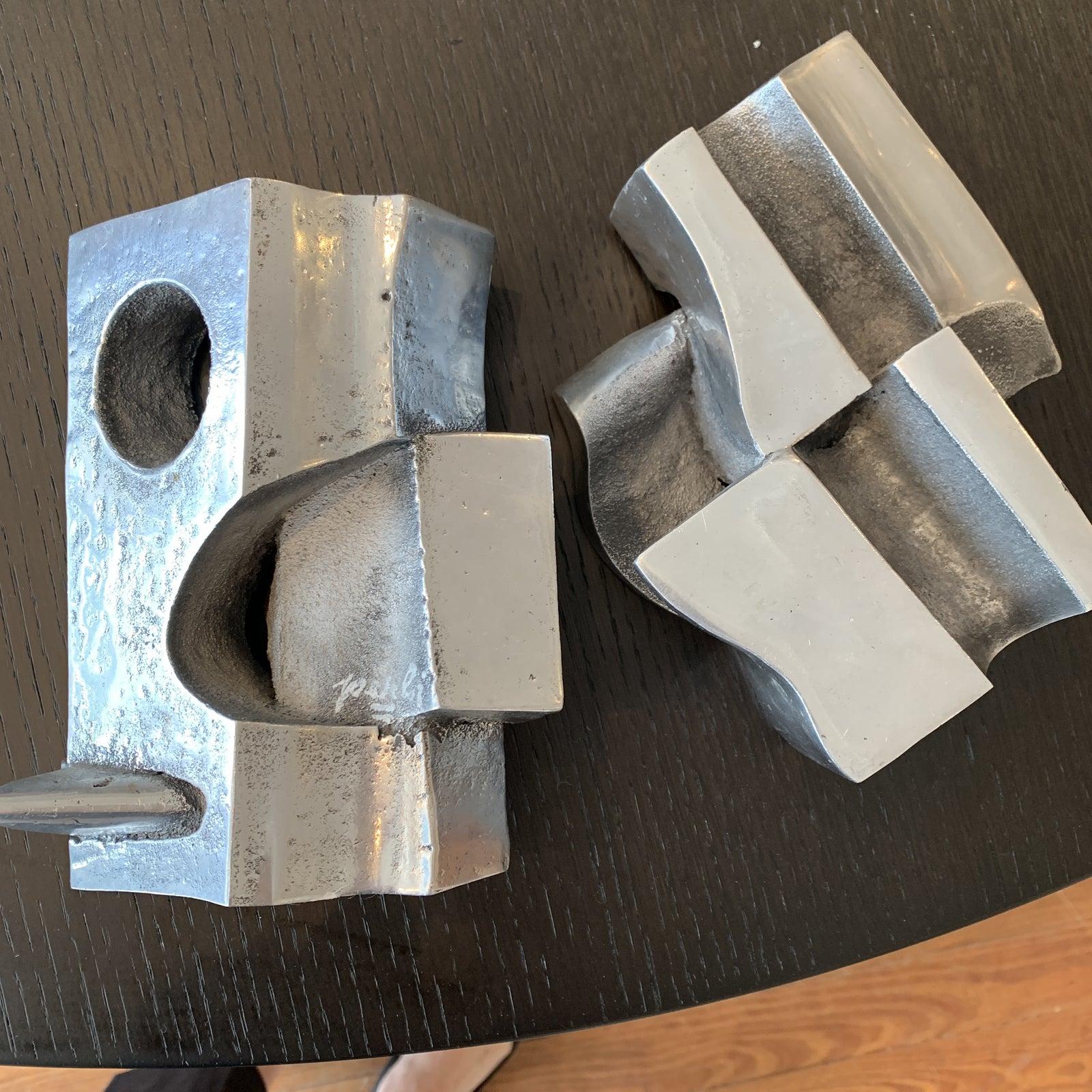 Set of 3 Mid Century Modern Cast Aluminum Sculptures 
Each is Inscribed 
Artist Unknown 
Geometric Shapes with a Puzzle Feel - more pictures and video are available upon request. 