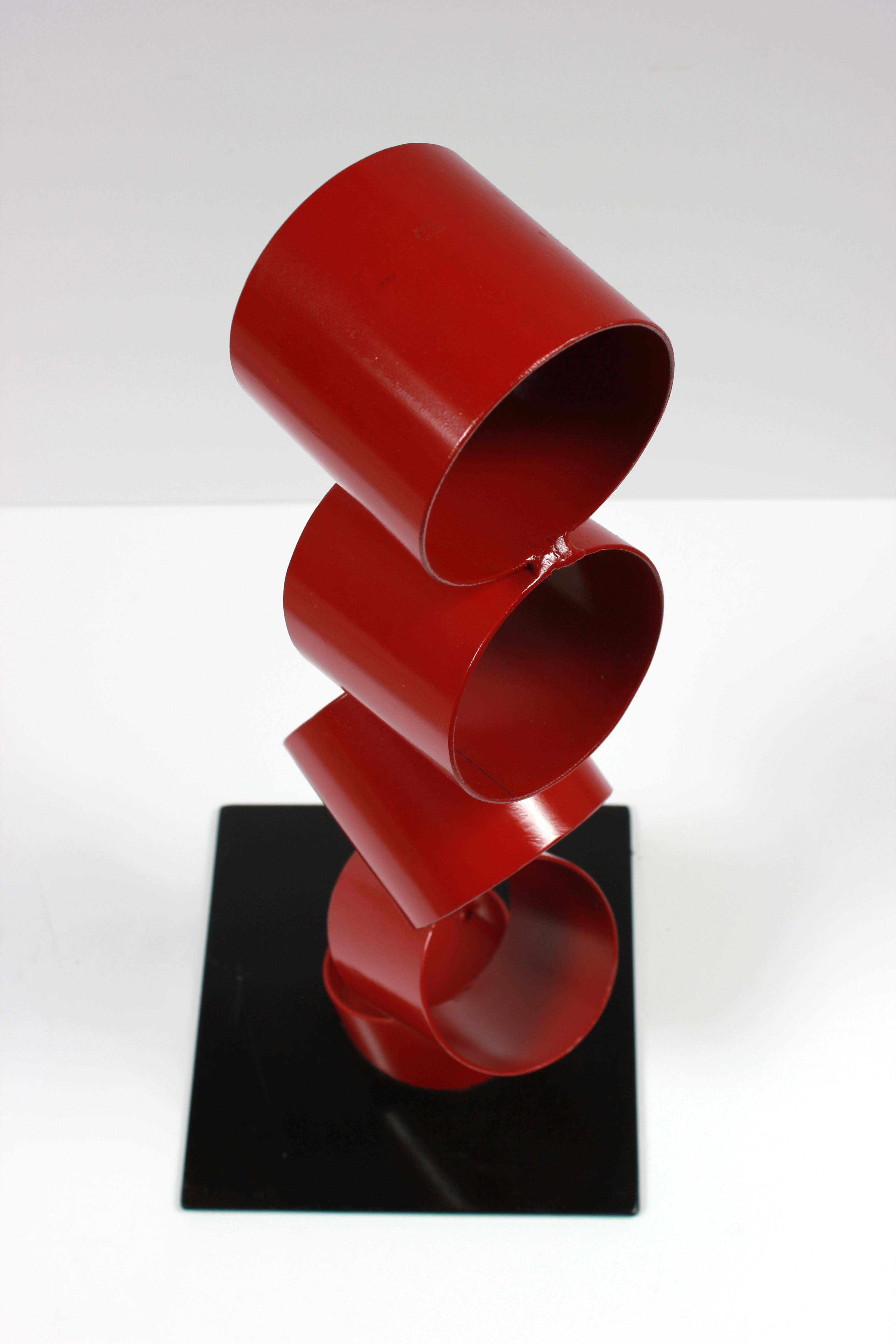 Multimedia Metal Sculpture of Six Red Rings in an Angled Stack 2