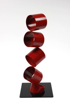 Multimedia Metal Sculpture of Six Red Rings in an Angled Stack