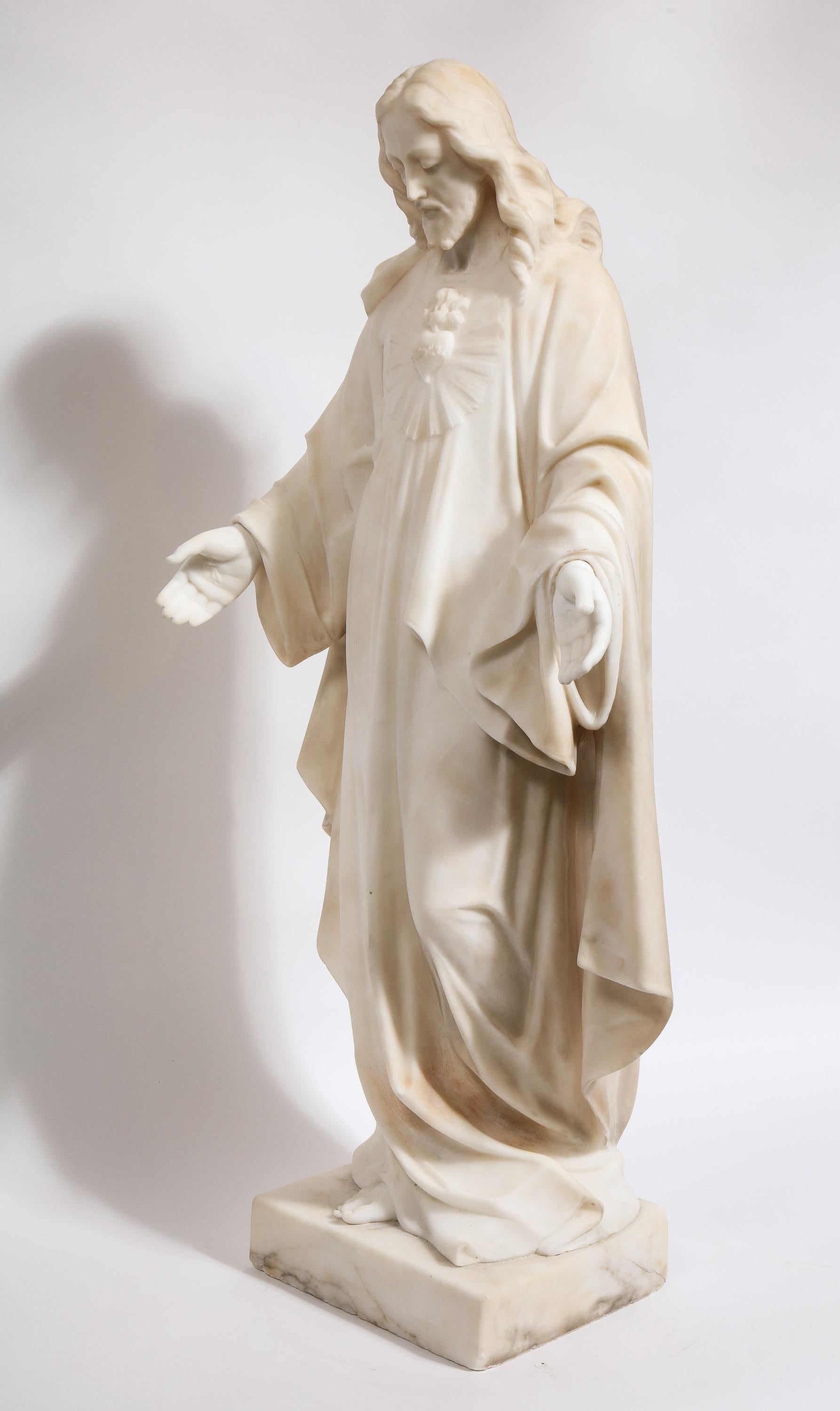 statue with cloth over face