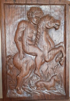 Scena mitologica: cavaliere maschio nudo e il suo cane Scultura francese in rilievo