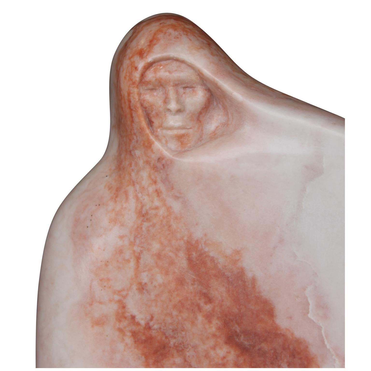 hooded figure statue