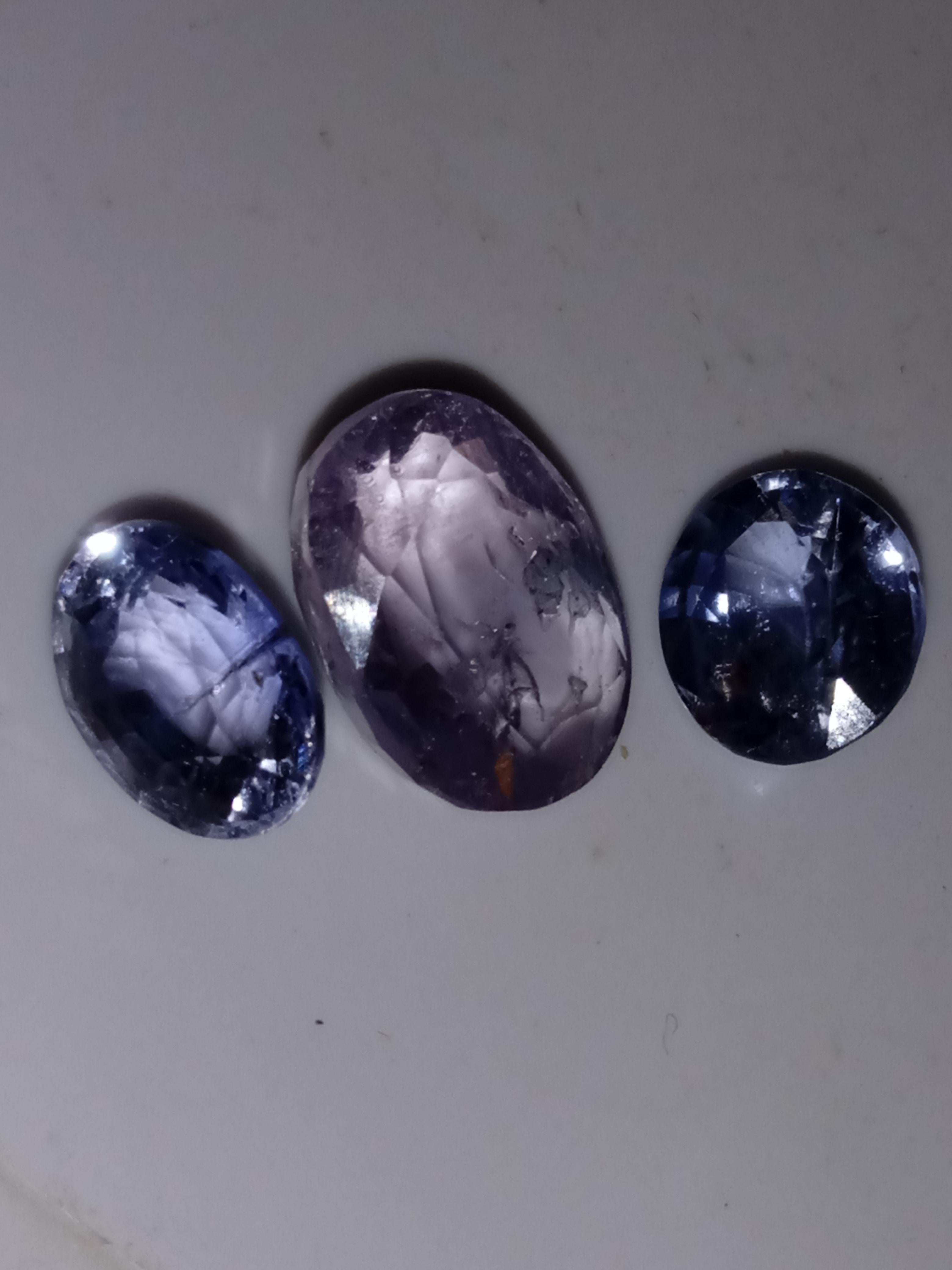 Natural purple sapphires not treated not heated weight 6.35 carat 
This stunning set of three natural purple sapphires, with a total weight of 6.35 carats, is a must-have for any gemstone collector. The deep purple colour of the oval-shaped stones