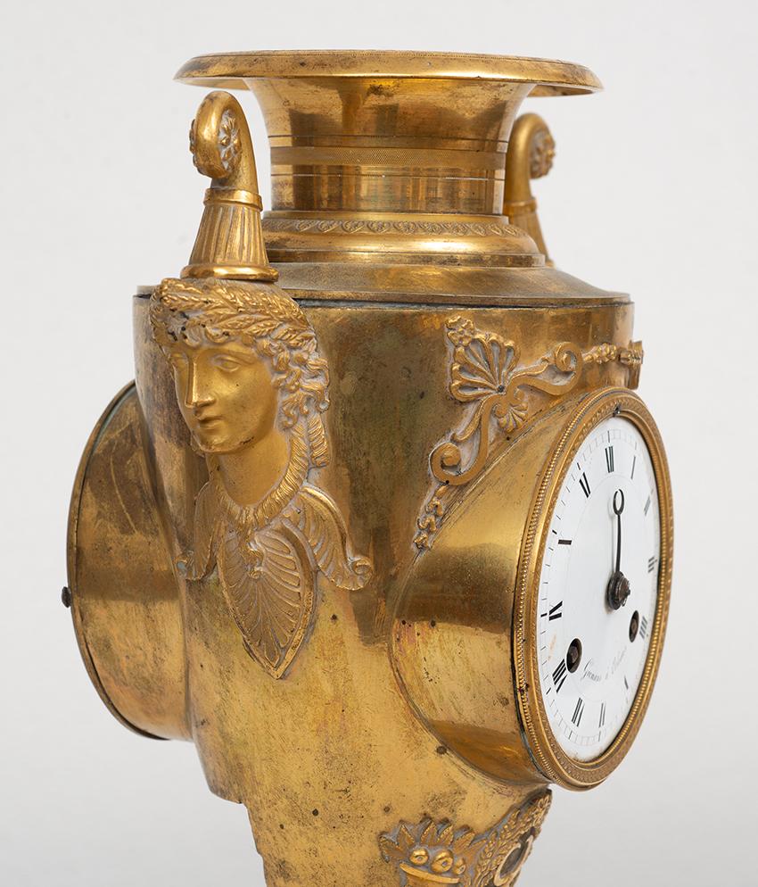 Finely chiseled gilt bronze French Empire antique clock.  - Sculpture by Unknown