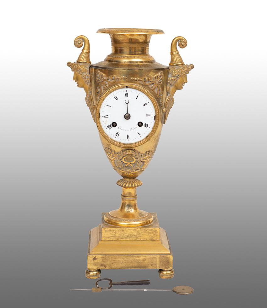 Unknown Figurative Sculpture - Finely chiseled gilt bronze French Empire antique clock. 